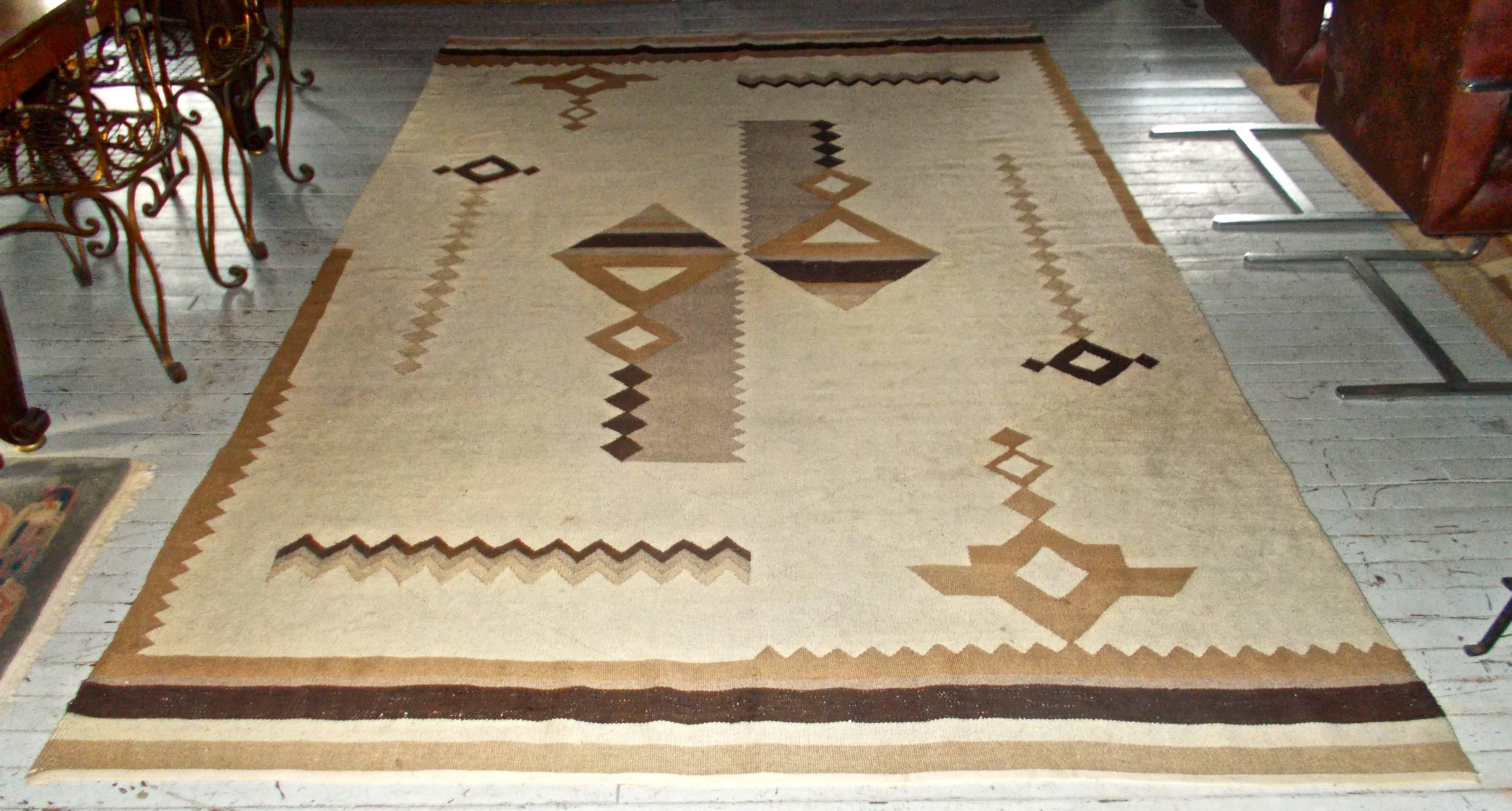 Axial symmetric French Art Deco rug in beiges.
