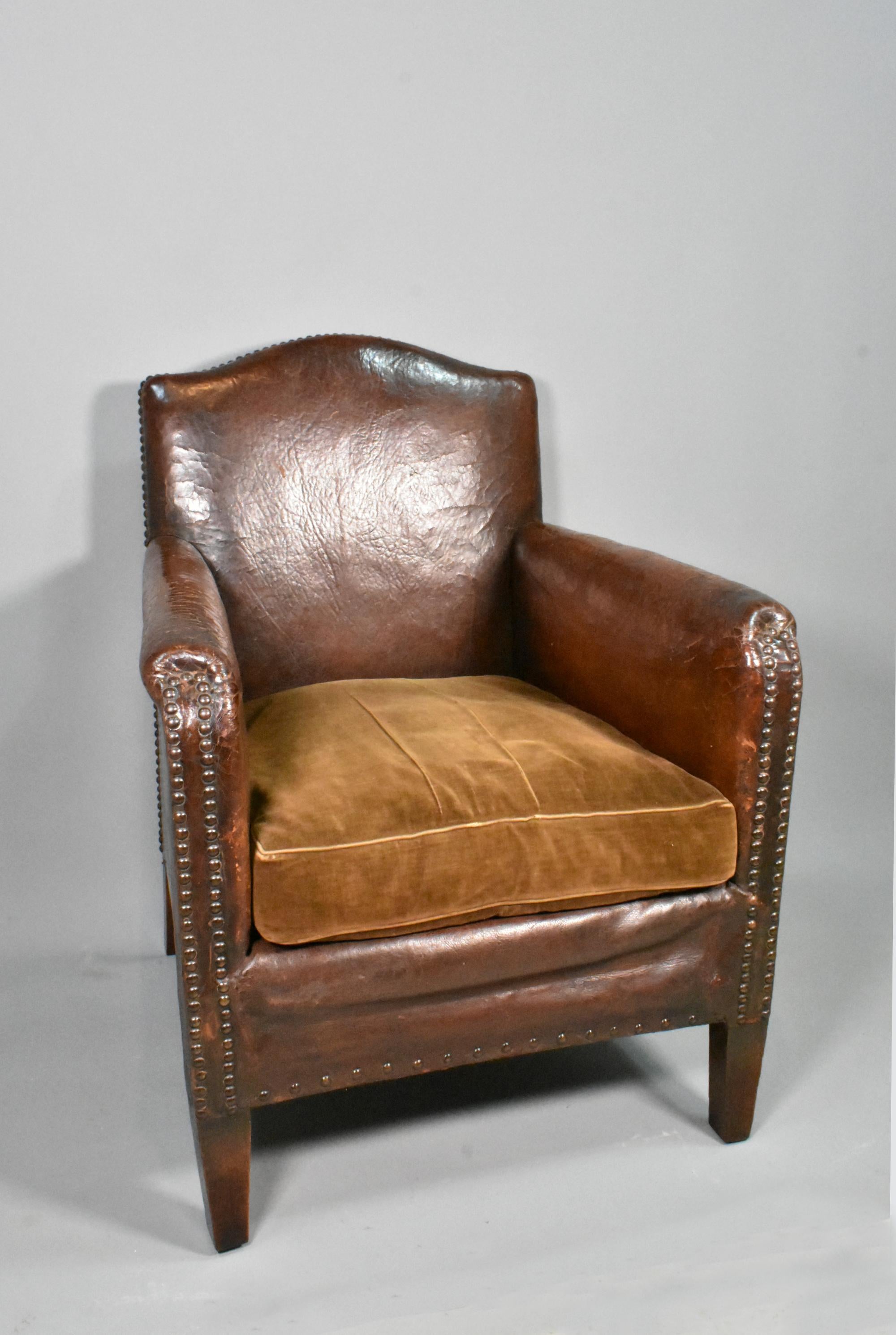 French Art Deco Leather Armchair

This lovely deep-seated Art Deco leather armchair retains its original upholstery.
 
The deeply sprung seat comes with its original fitted soft cushion in matching brown velour with piped surround.
 
The
