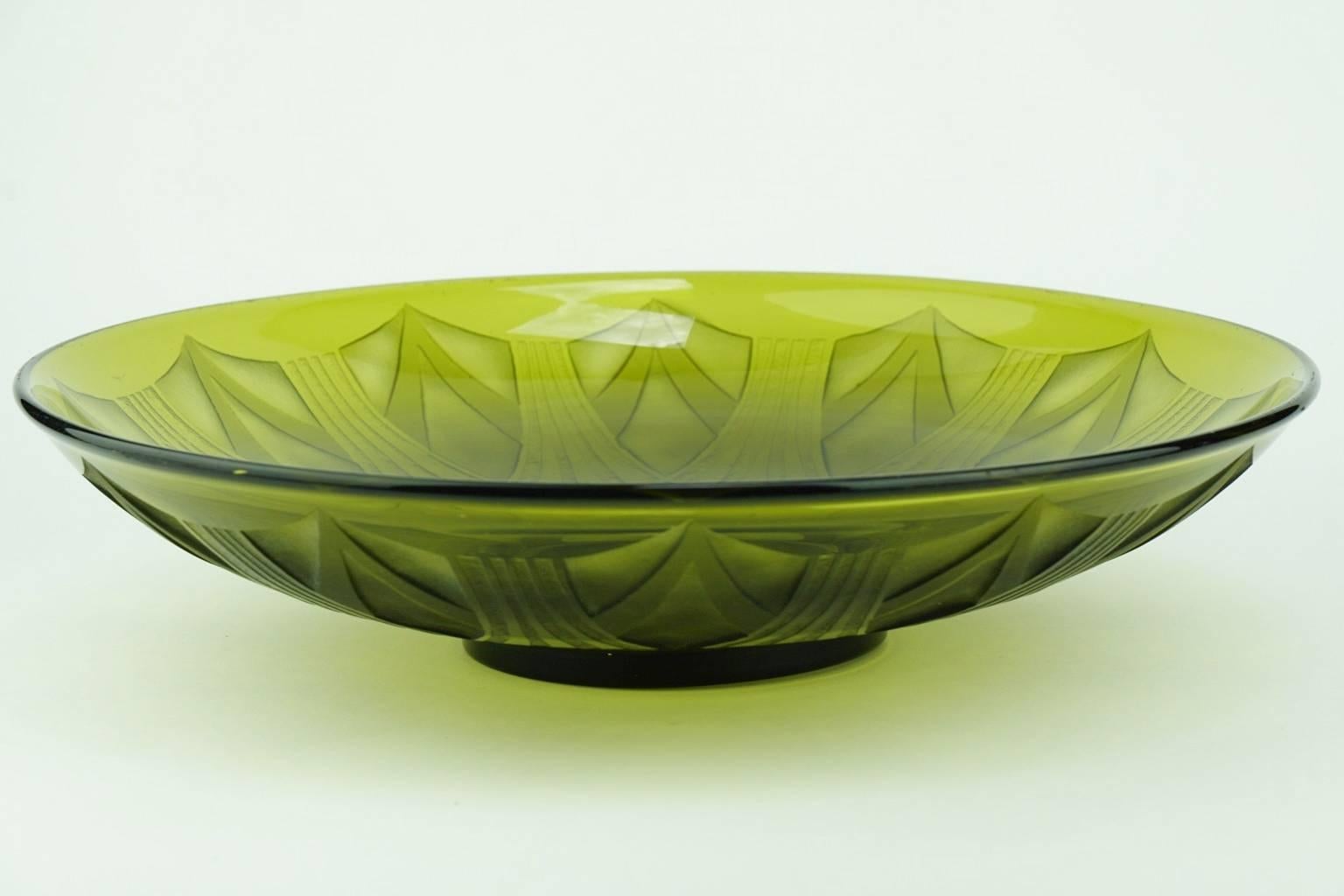 Large decorative dish in typical Art Deco Legras olive green acid-etched glass. Signed.