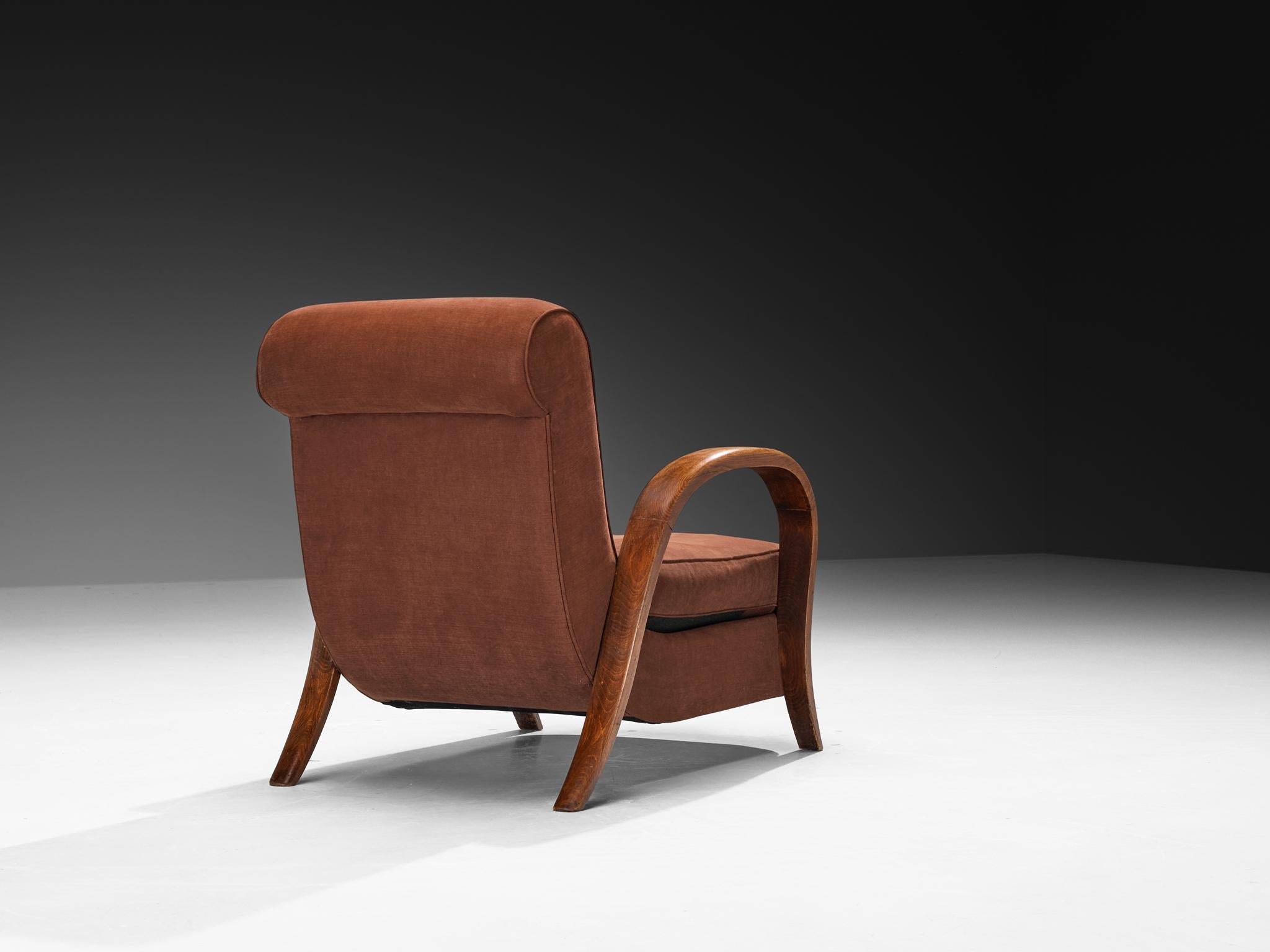 Mid-20th Century French Art Deco Lounge Chair with Elegant Arched Armrests