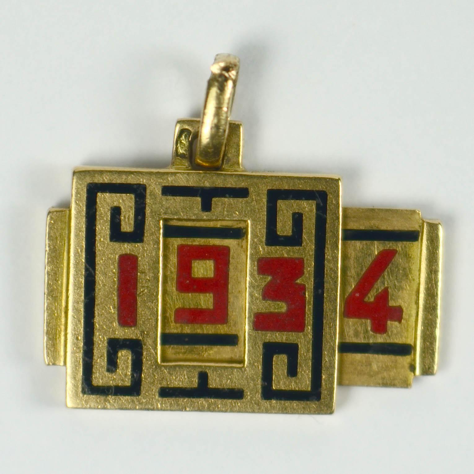 An unusual lucky 13 charm designed to resemble a Cartier clock with Chinese motifs and a sliding door to reveal the year 1934. A charm with a similar mechanism is illustrated in the Cartier Collection book. Stamped with French marks for 18 karat