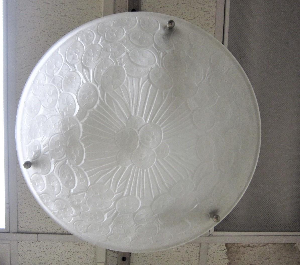 French frosted art glass original Art Deco bowl shaped pendant fixture produced by the renown Parisian firm of Etling. A frosted white molded glass shade featuring an honesty / monnaie du pape pattern is suspended by a nickeled bronze armature,
