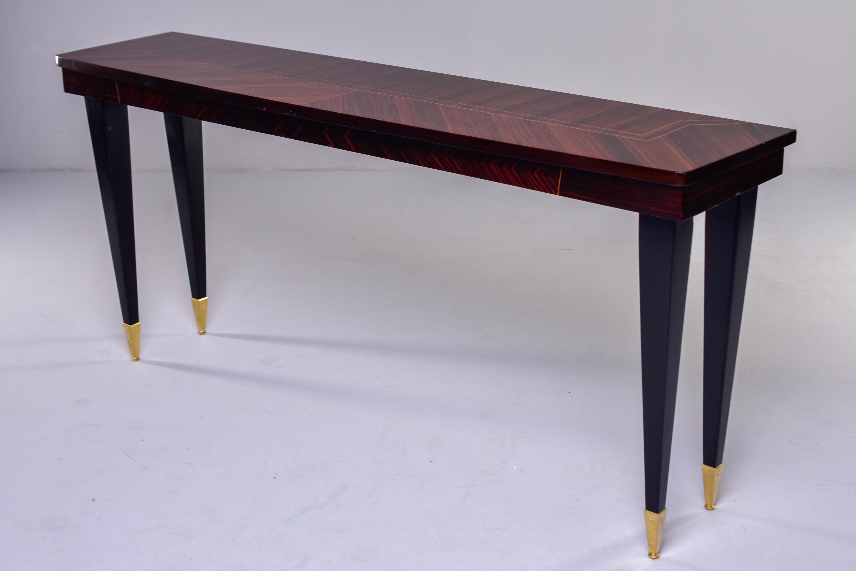 French Art Deco Macassar Ebony Console with Brass Capped Black Legs 3