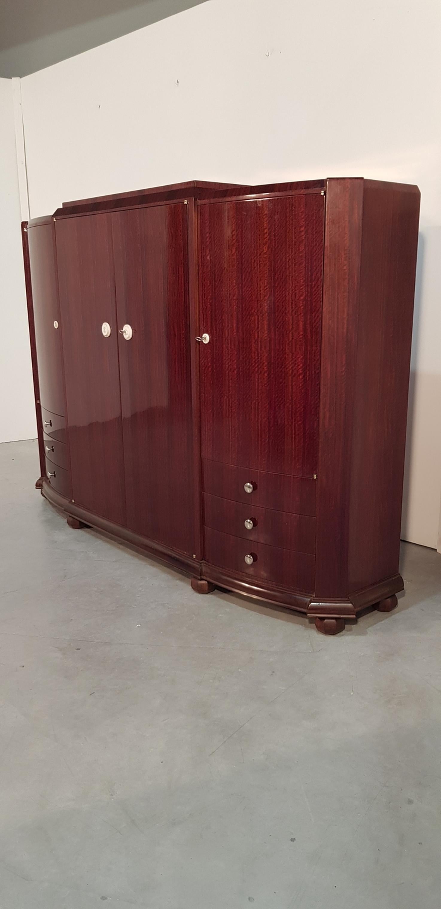 Unique Art Deco sideboard from Paris. Nice mahogany veneer, original repaired old metal locks and keys. Special low depth and high shape in the style of Dominique (André Domin and Marcel Genevriere) France, 1930s. Recently restored.