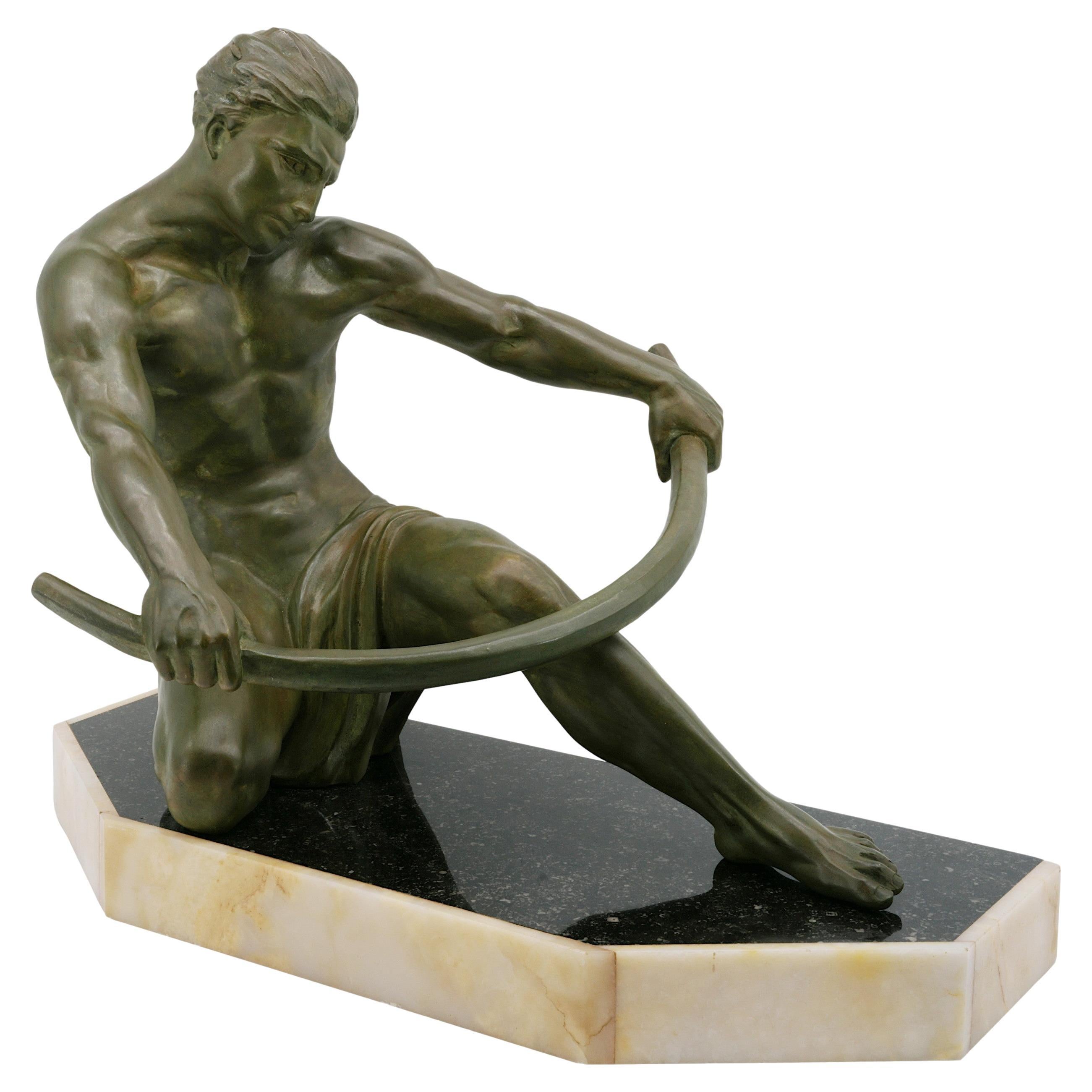 French Art Deco man sculpture, France, circa 1925. Spelter, marble & onyx. Width : 21.25