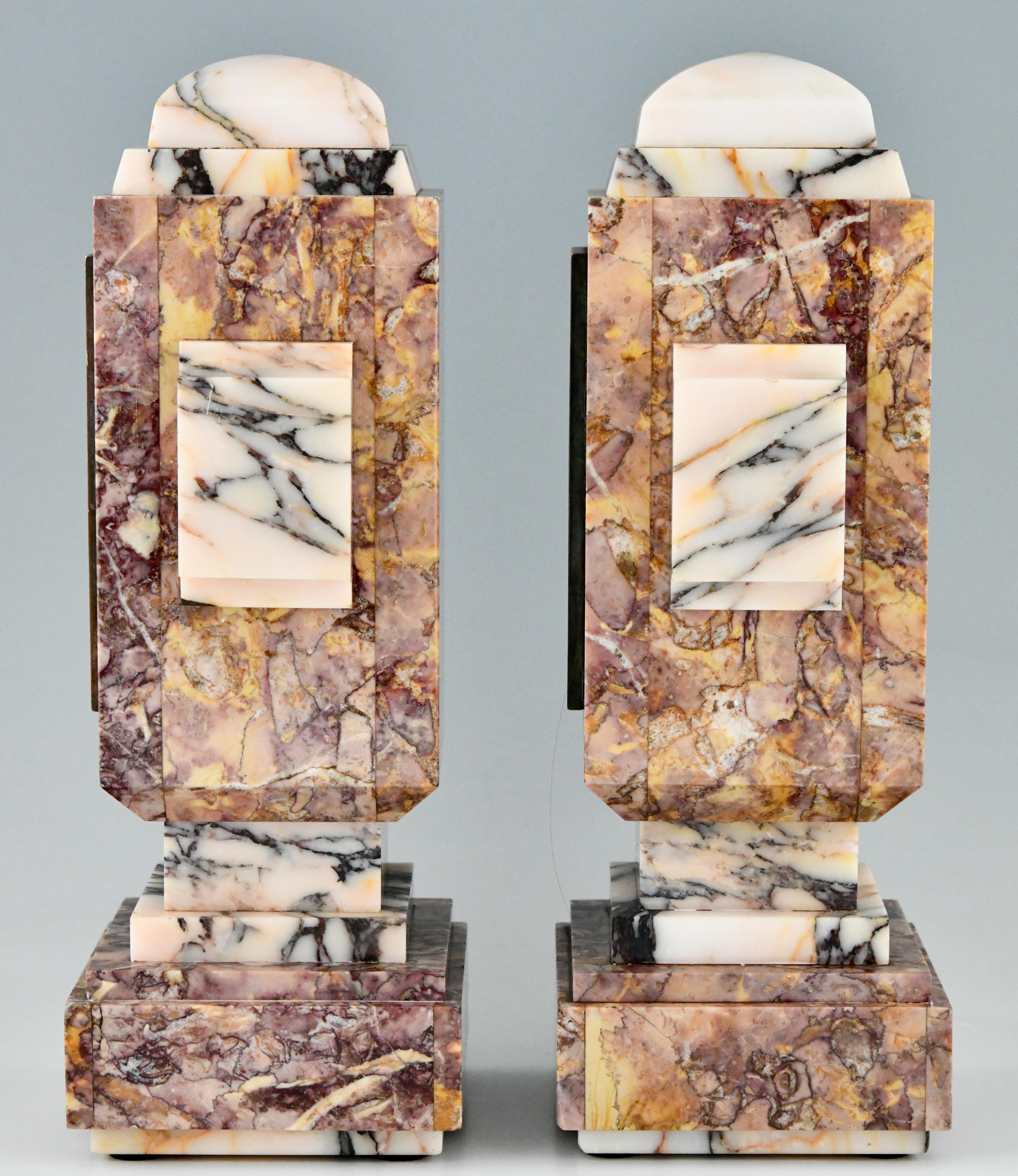 Pair of French Art Deco marble and bronze cassoulet vases with elephants. Ca. 1925. Marble and bronze.