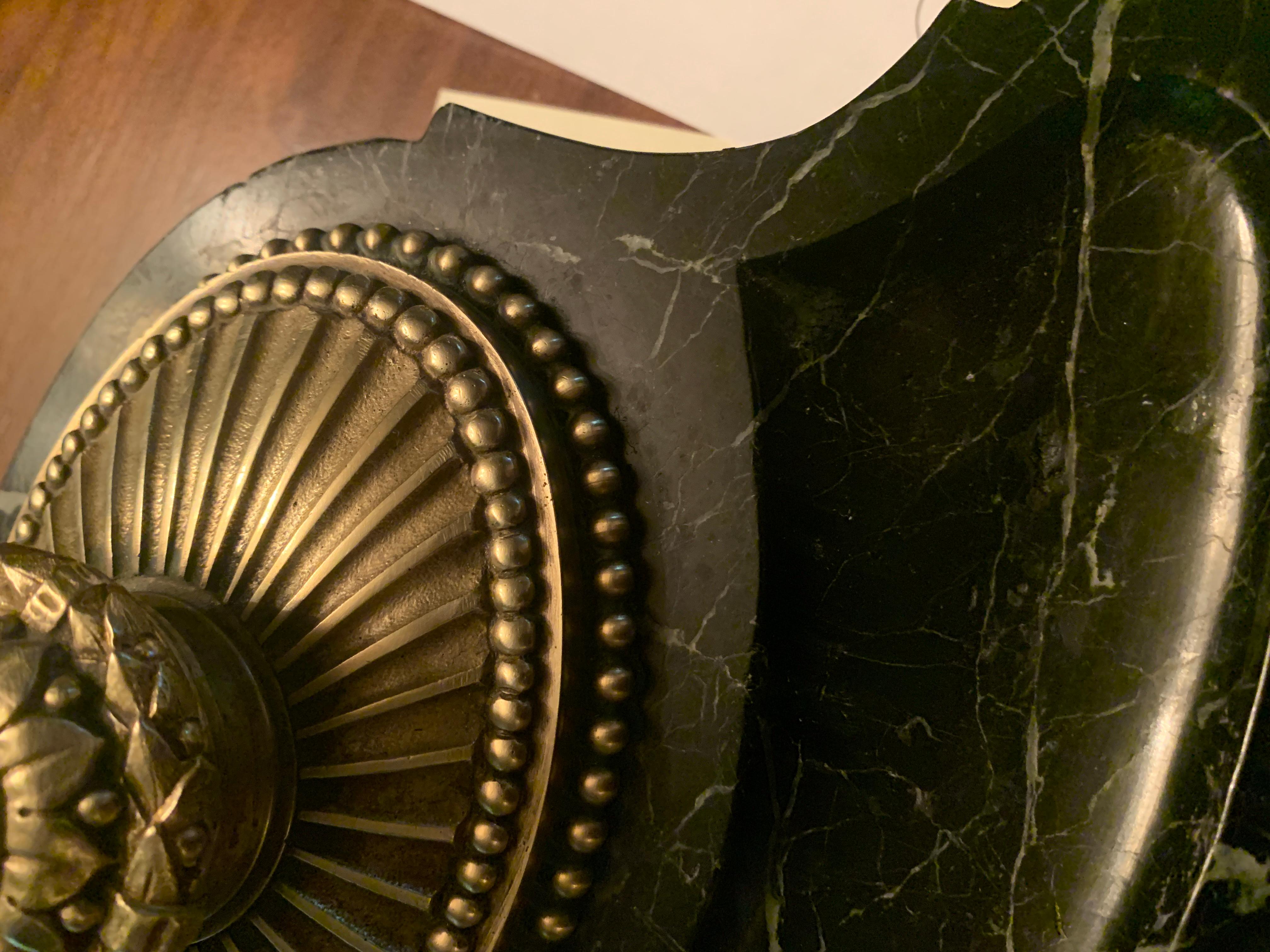 French Art Deco marble inkwell with bronze details and well atop. The size and wonderful art deco detail make for this piece a complement to many desks. The details also extend to the feet which are very intricate and bronze as well. 

The marble