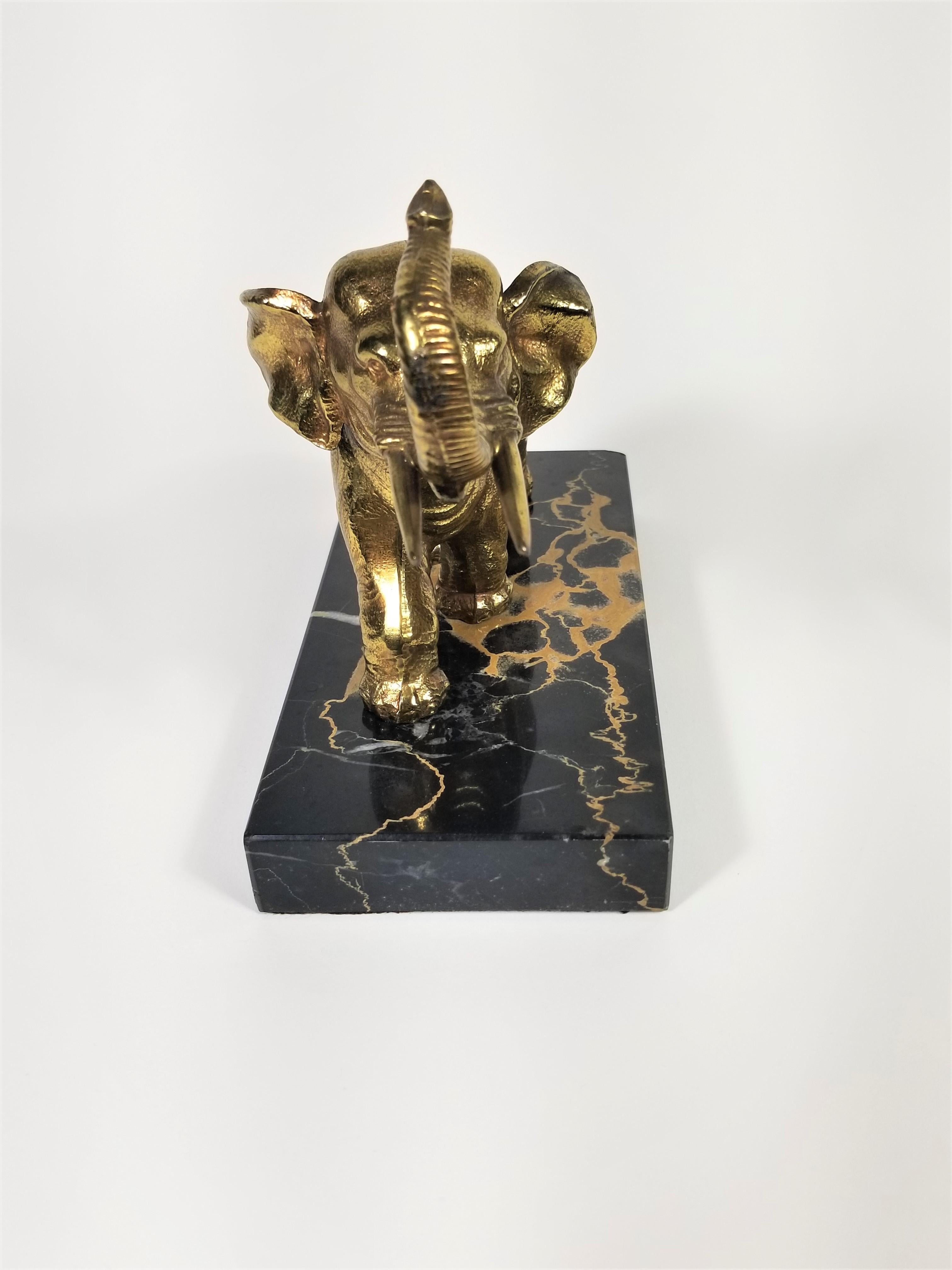 gold elephant bookends