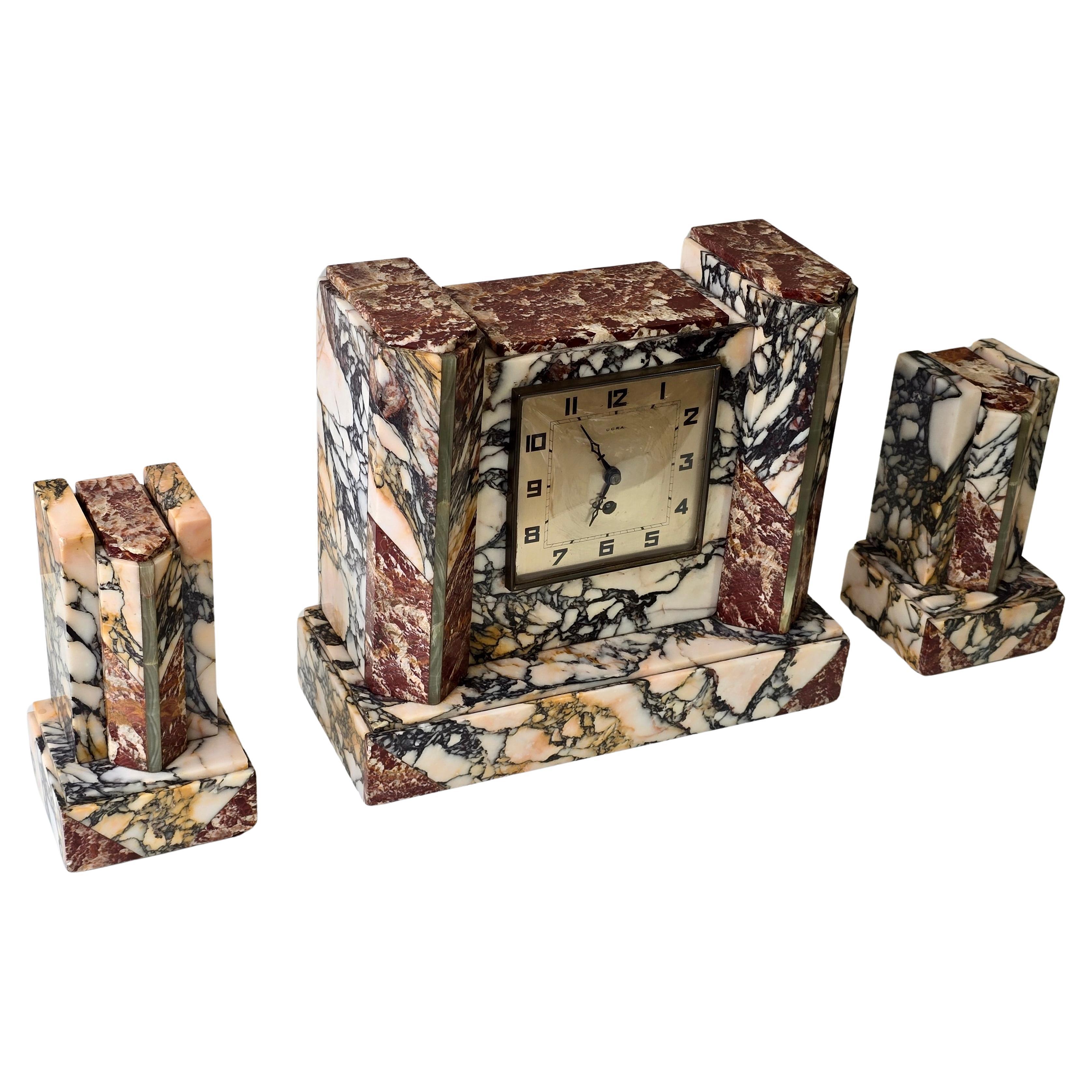 French Art Deco Marble Mantel Clock with Garnitures, UCRA, circa 1930 en venta