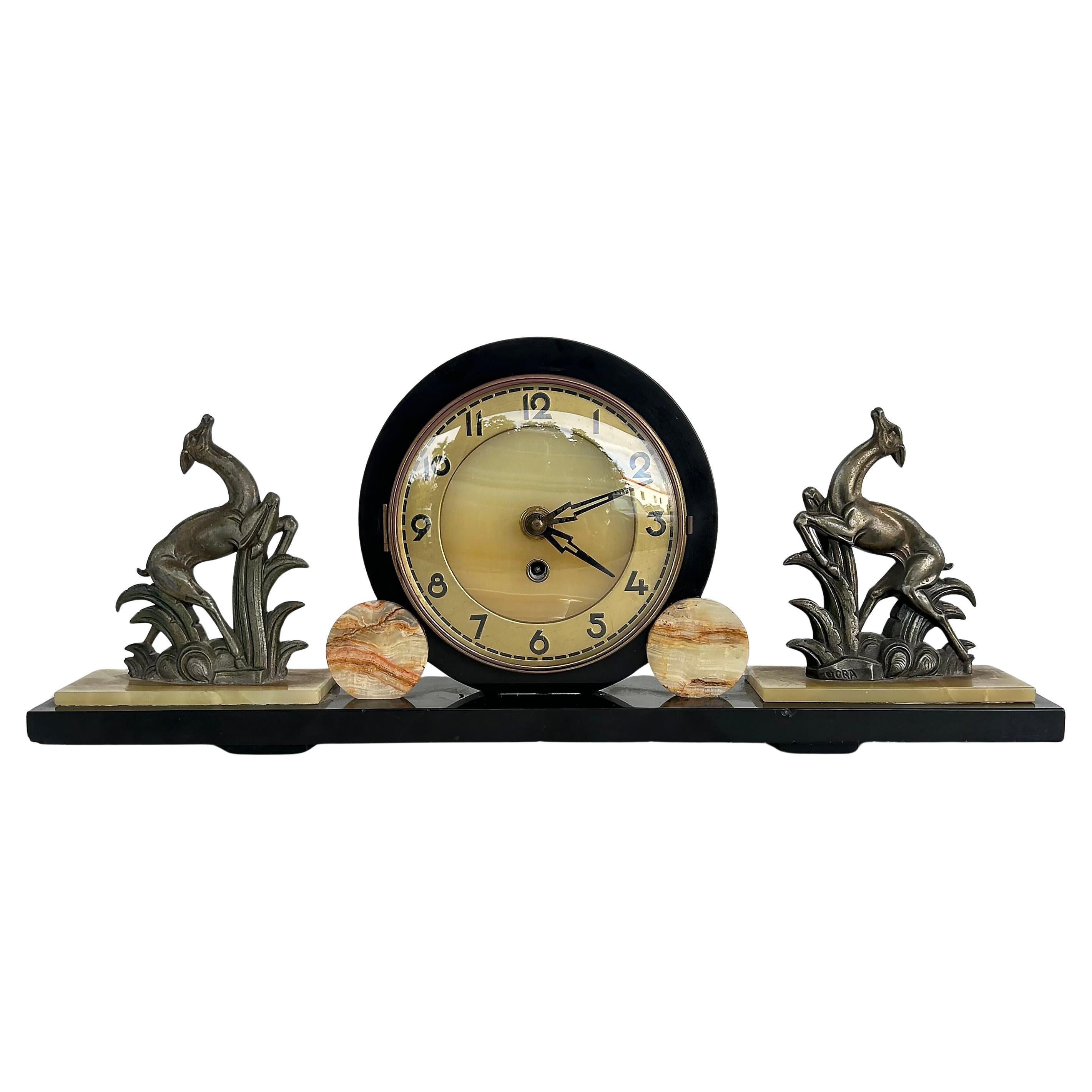 French Art Deco Marble Onyx Mantel Clock with Gazelles Signed Ucra 1930s