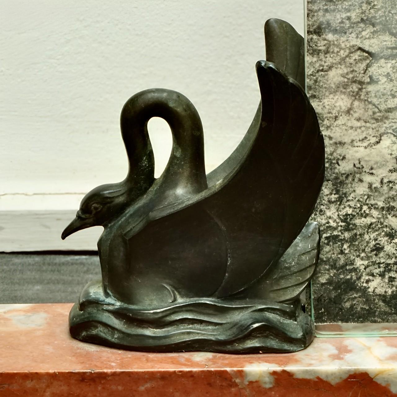 
Beautiful French Art Deco marble picture frame, with a pair of decorative swans. Measuring length 48 cm / 18.9 inches by width 7 cm / 2.75 inches, and height 22.5 cm / 8.85 inches. The metal swans have aged patina, one has a crack (see photo 5). We