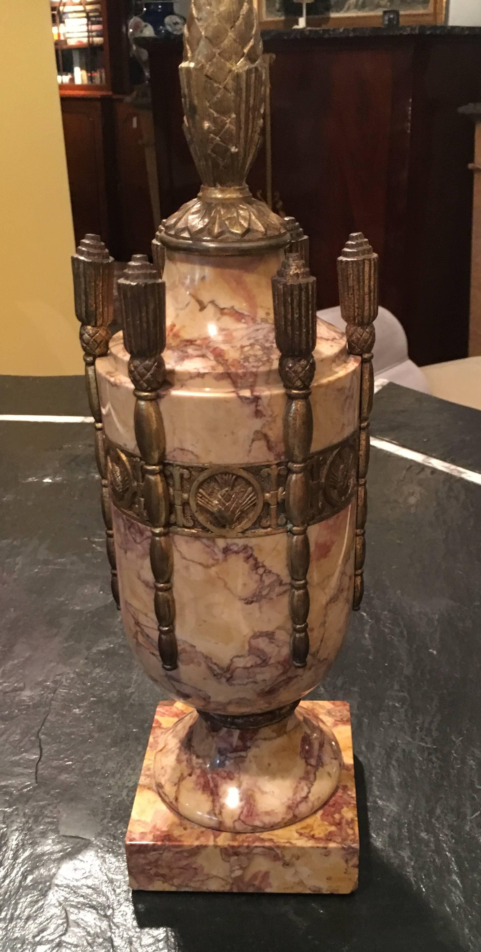 French Art Deco marble urns with bronze,
circa 1920.


     