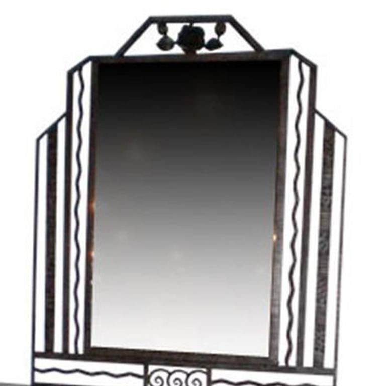 Miroir et console Art Déco en fer forgé et verre avec dessus en marbre noir.<br />
<br />
miroir : 41