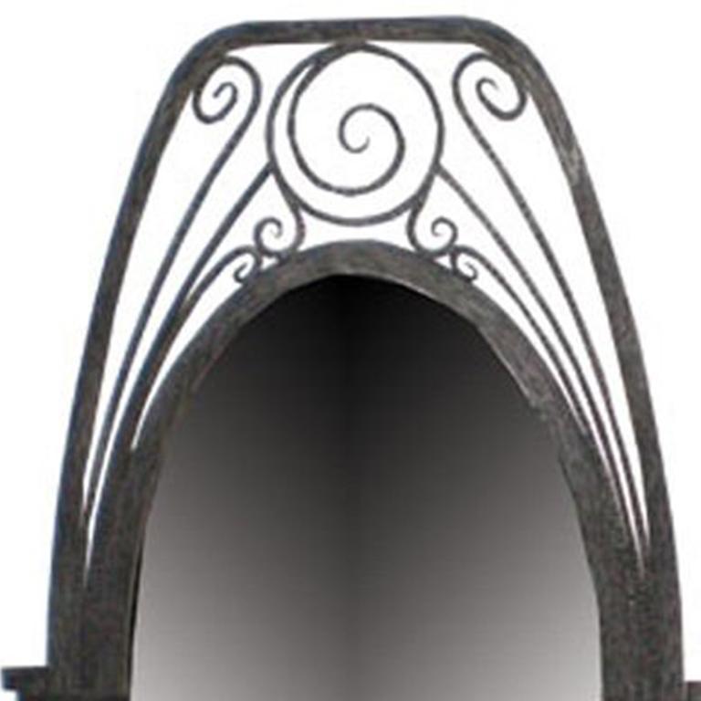 French Art Deco wrought iron and glass mirror with scroll pattern.