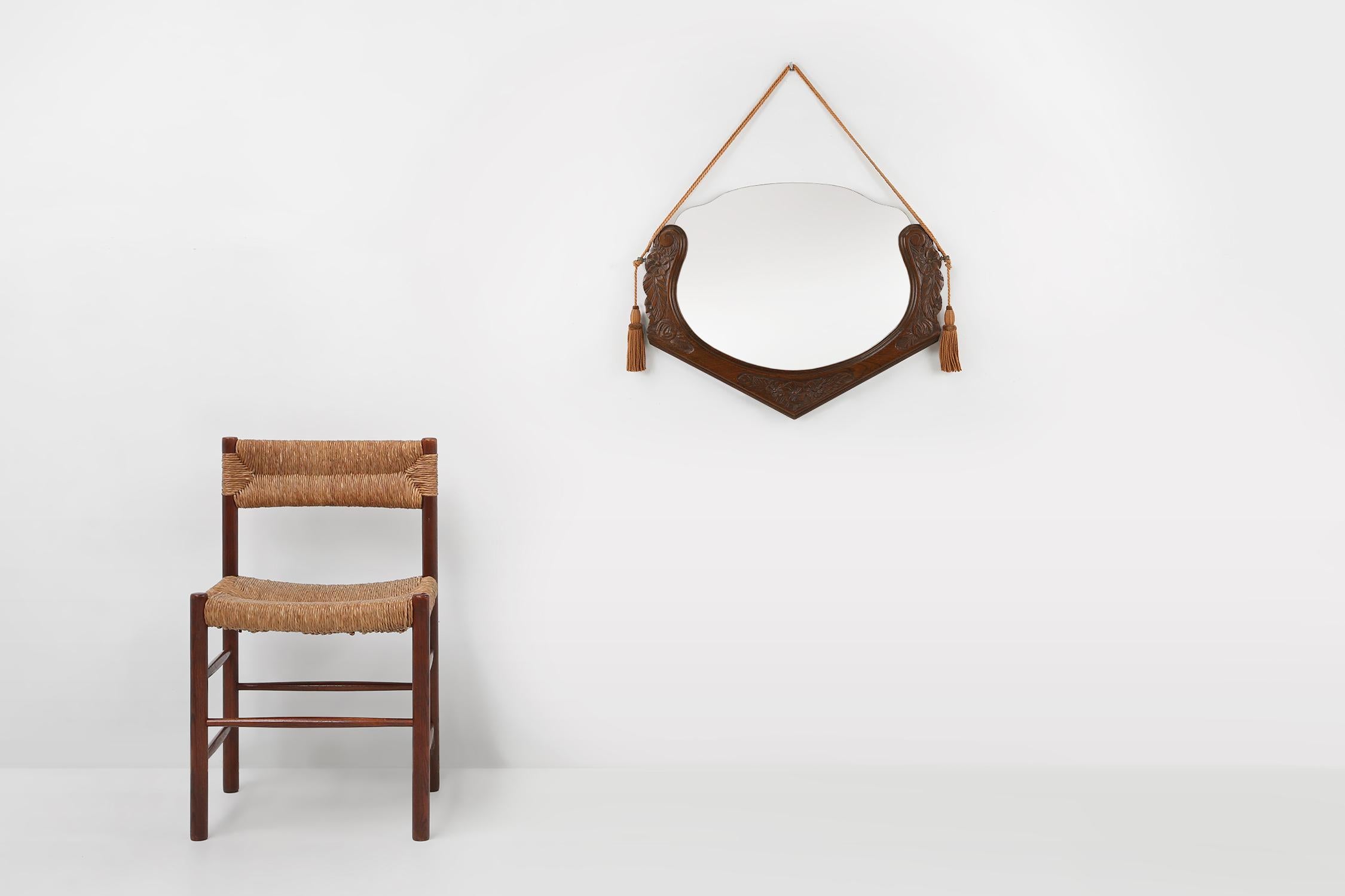 France / 1940 / mirror / oak / Art Deco

Beautiful Art Deco semi-frameless wall mirror with oak wooden frame and carved floral decorations elegantly suspended on original cords. Made in the 1940s in France.

Whether placed in a chic entryway, a
