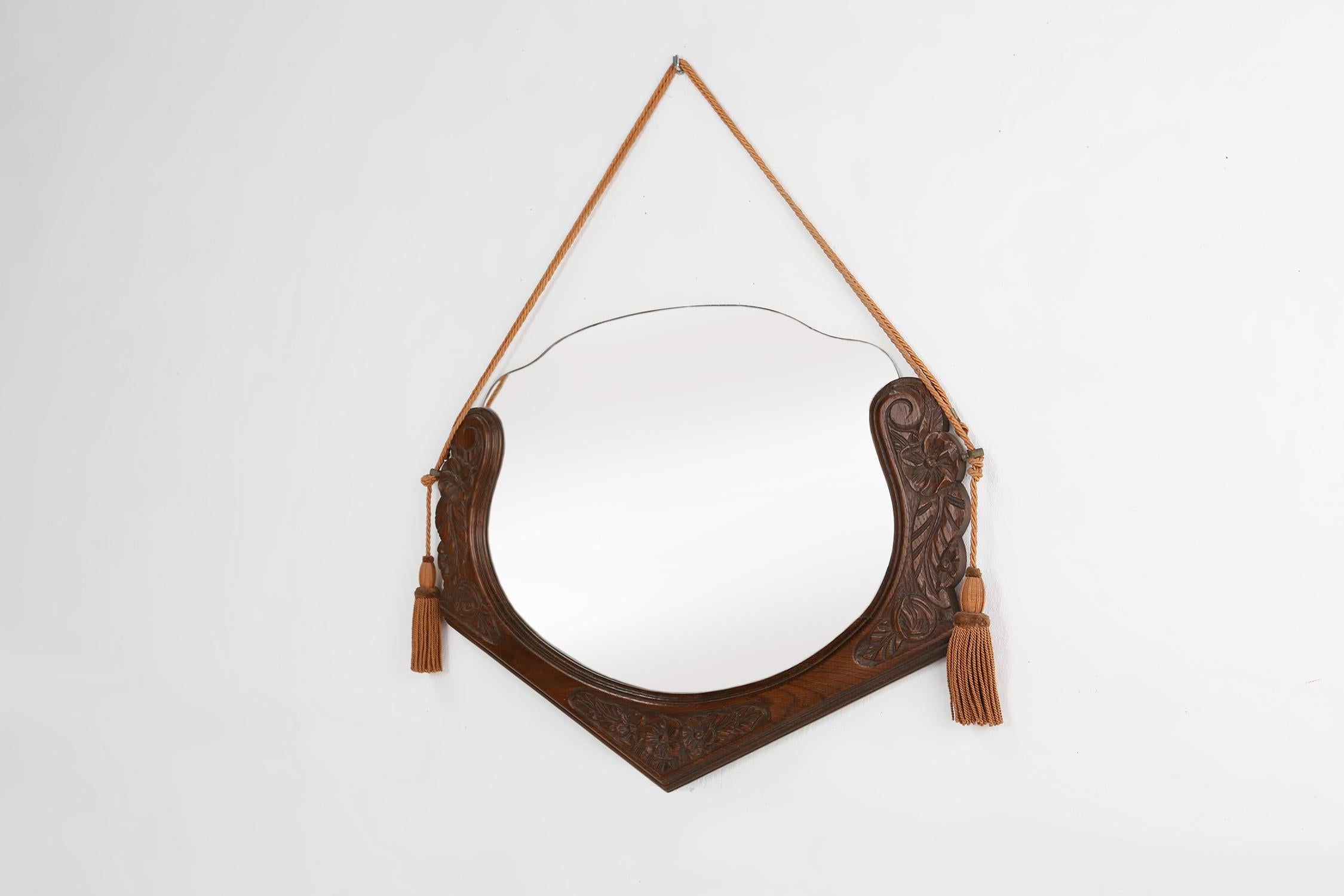 Hand-Carved French Art Deco mirror in oak with floral carvings, 1940s