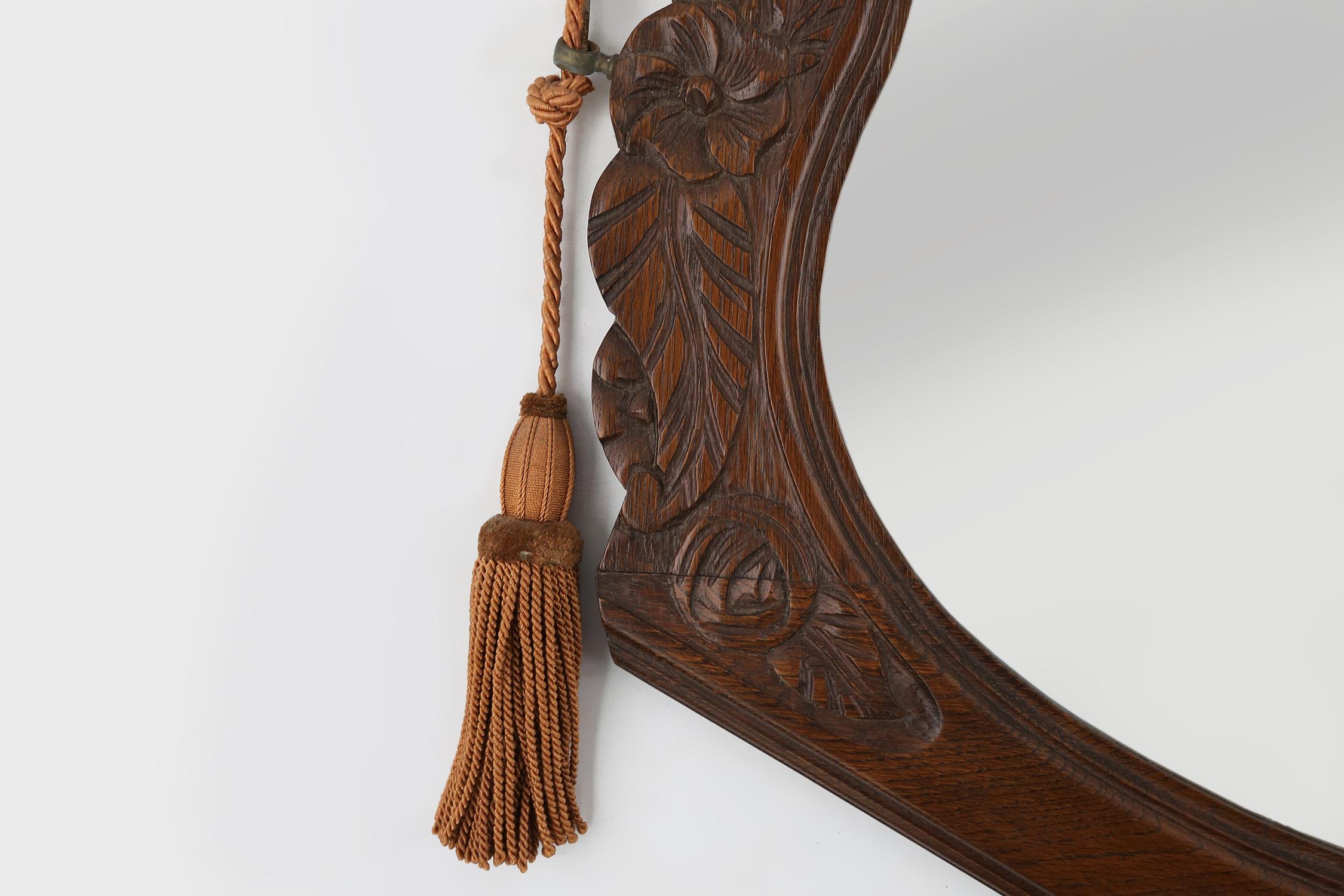 French Art Deco mirror in oak with floral carvings, 1940s In Good Condition In Meulebeke, BE