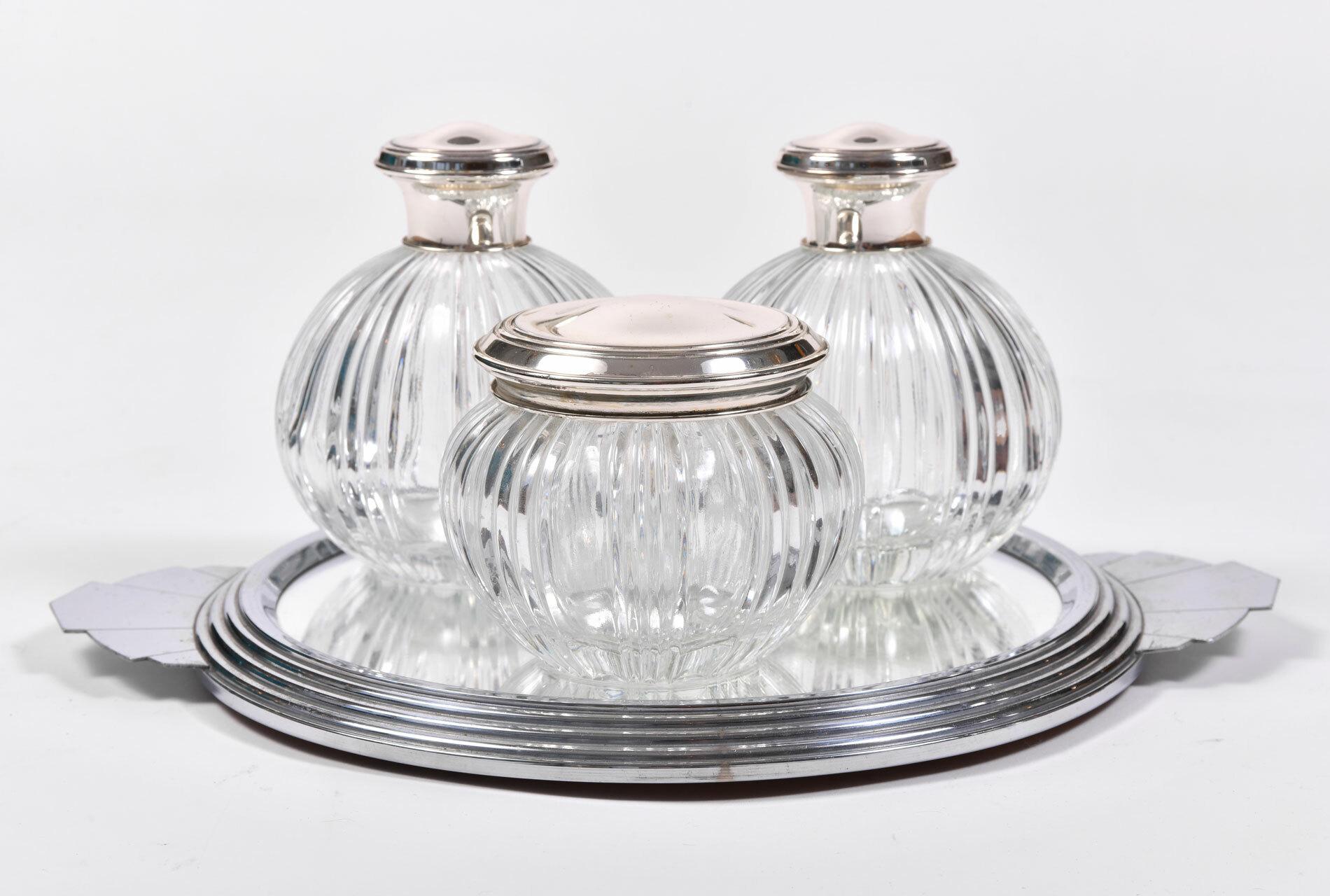 Chrome tiered Art Deco tray with decorative handles and mirrored inset.