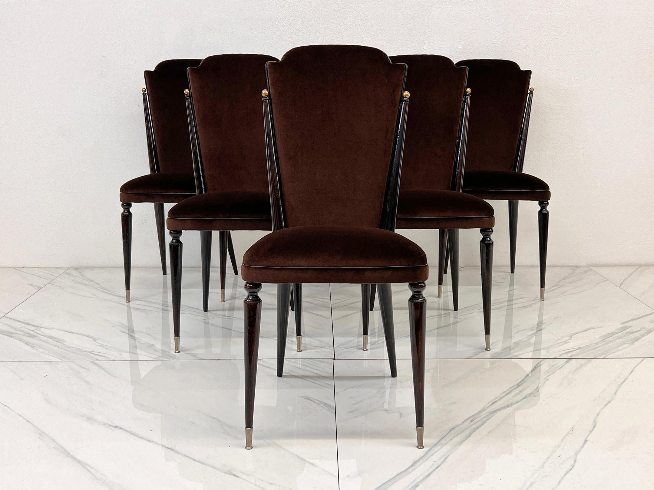 Allow me to introduce your dining room’s new best friends—a set of six French stunners that are equal parts regal, refined, and ridiculously fabulous. These mid-century modern/art deco hybrid chairs are here to turn every dinner party into a soirée