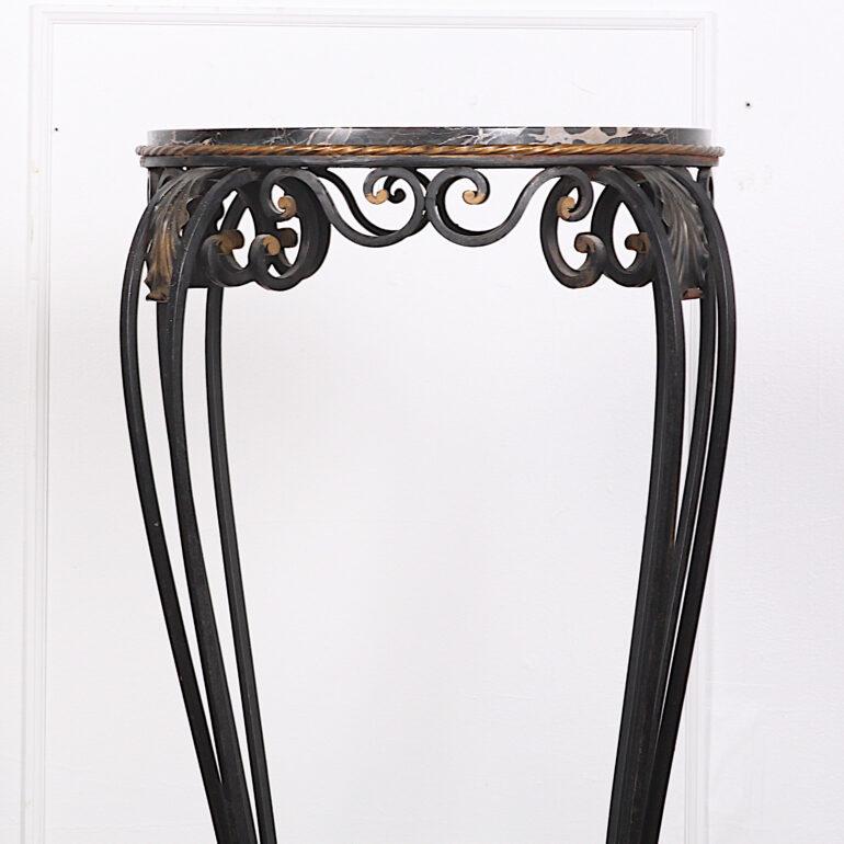 Top-quality French table or stand with tapering serpentine wrought iron legs with scrolled / leaf details and striking Portoro marble top.
Attributed to Raymond Subes (1893-1970), a renowned French designer / metalworker whose pieces feature metal-