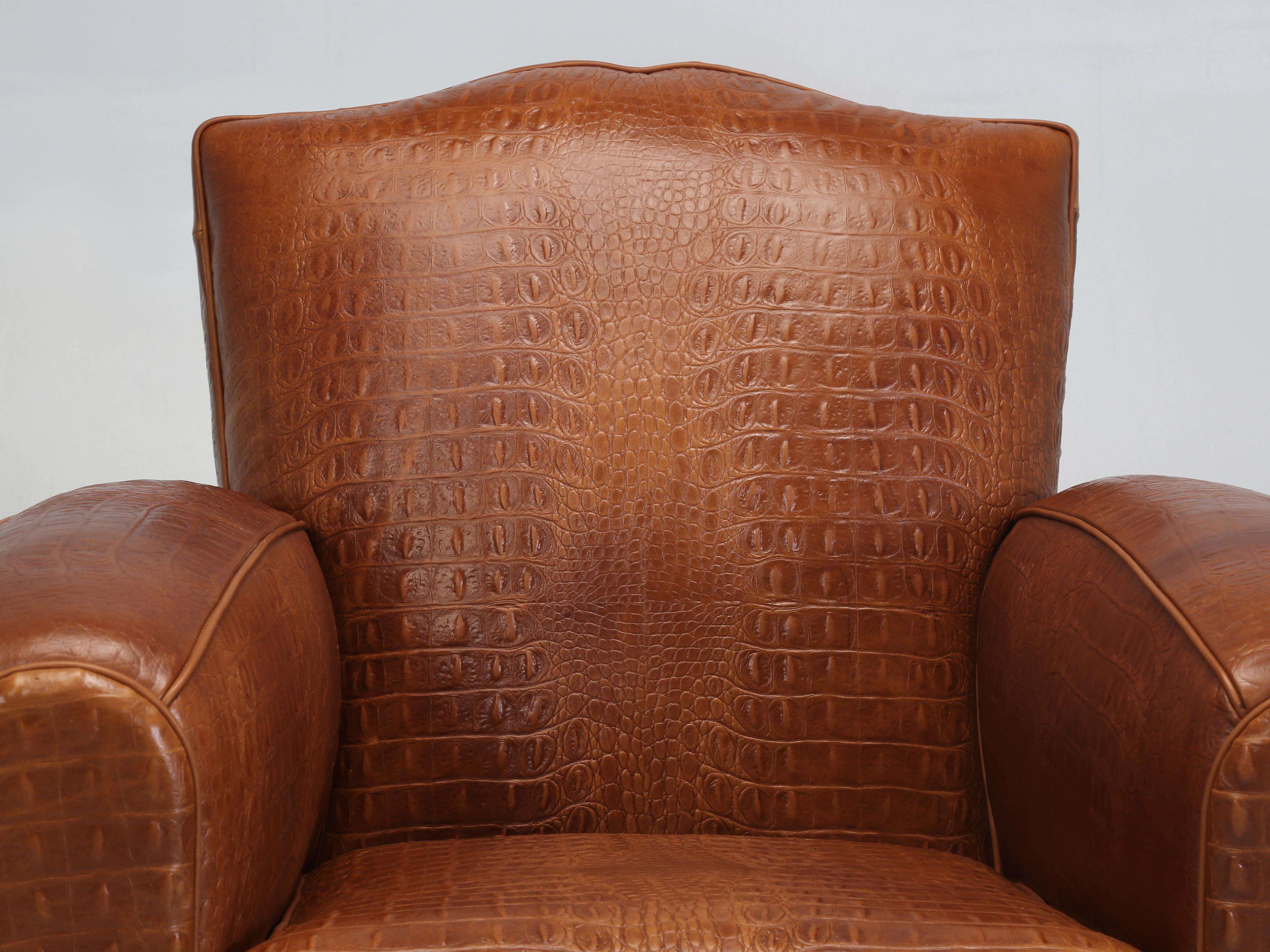 French Art Deco Moustache Style Leather Club Chair Upholstered in a Gorgeous Cognac Colored Faux Crocodile Real Leather imported from Italy and surprisingly soft for an embossed leather. We were inspired by our Original Crocodile 1920’s Club Chair,
