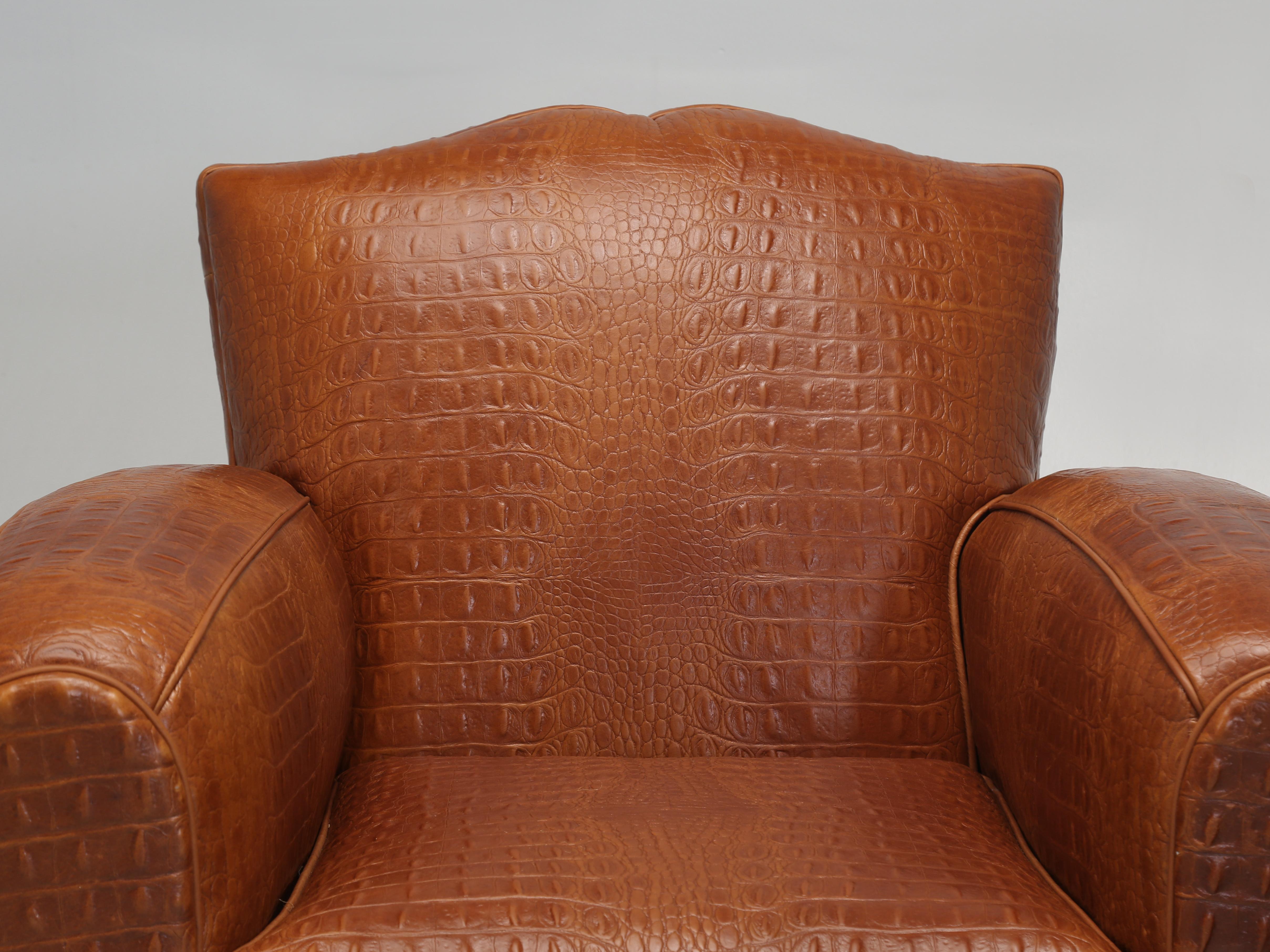 French Art Deco Moustache Style Leather Club Chair upholstered in a Gorgeous Cognac Colored Faux Crocodile Real Leather imported from Italy and surprisingly soft for an Embossed Leather. We were inspired by our Original Crocodile 1920’s Club Chair,