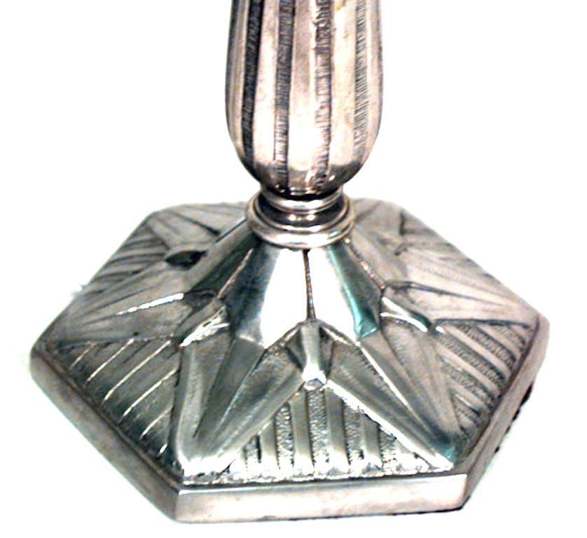 French Art Deco nickel-plated table lamp with geometric star and floral design on base and frosted glass shade (signed: DEGUE).
 