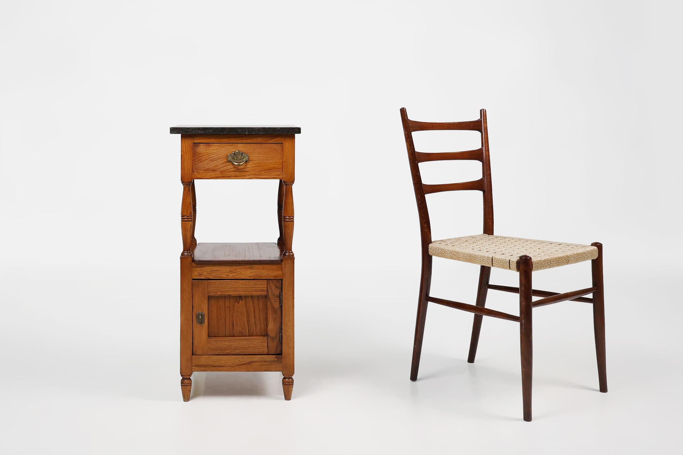 France / 1920 / Night stand / wood, blue stone / Art Deco / Mid-century / Vintage

A beautiful Art Deco night stand crafted in France around 1920. This small cabinet features a blue stone top, a drawer with very decorative hardware and a small