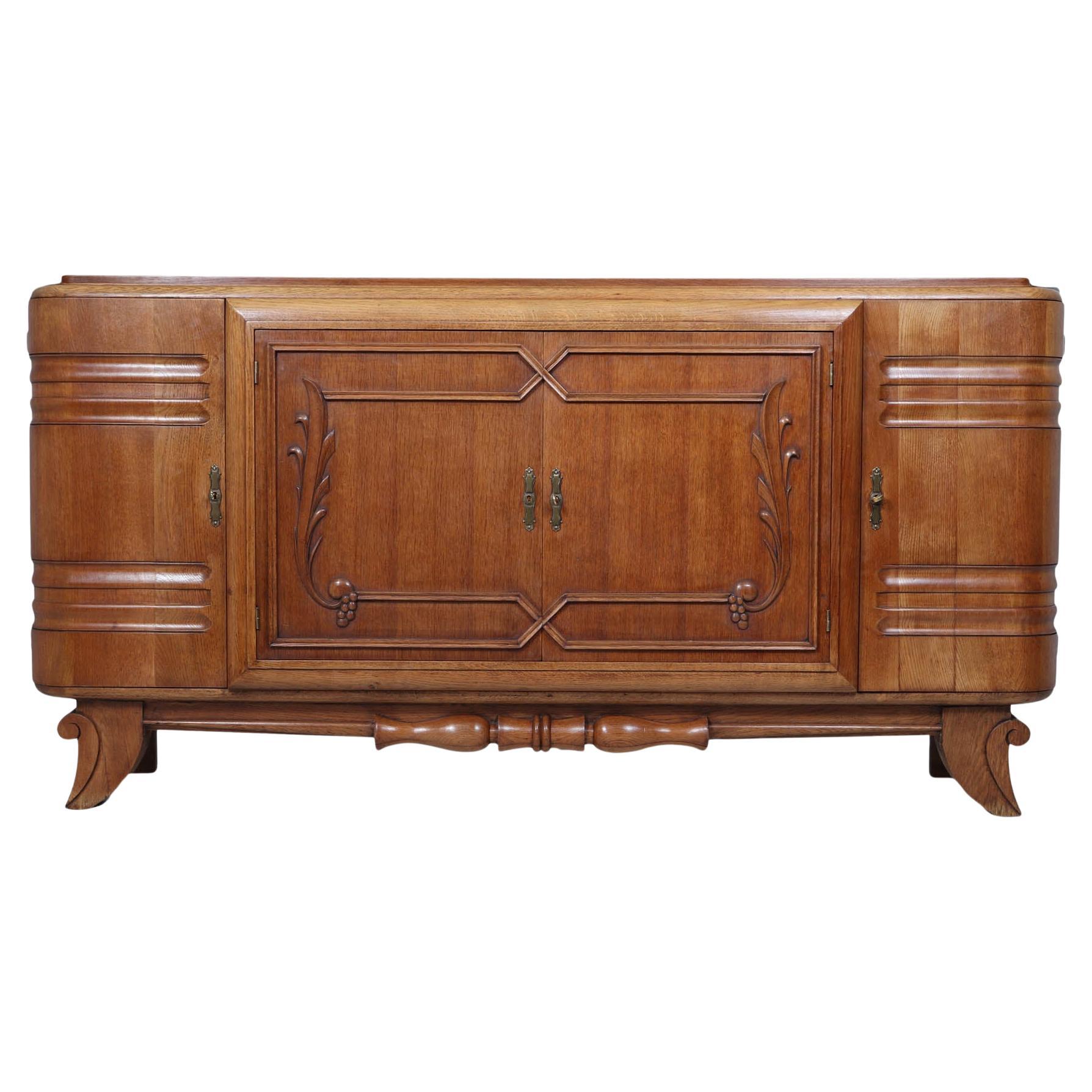 French Art Deco Oak Sideboard with Carved Doors, circa 1930s in vendita