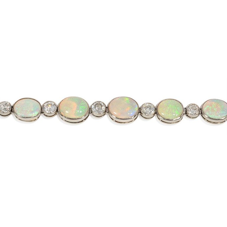 Oval Cut French Art Deco Opal, Diamond, and Platinum Line Bracelet For Sale