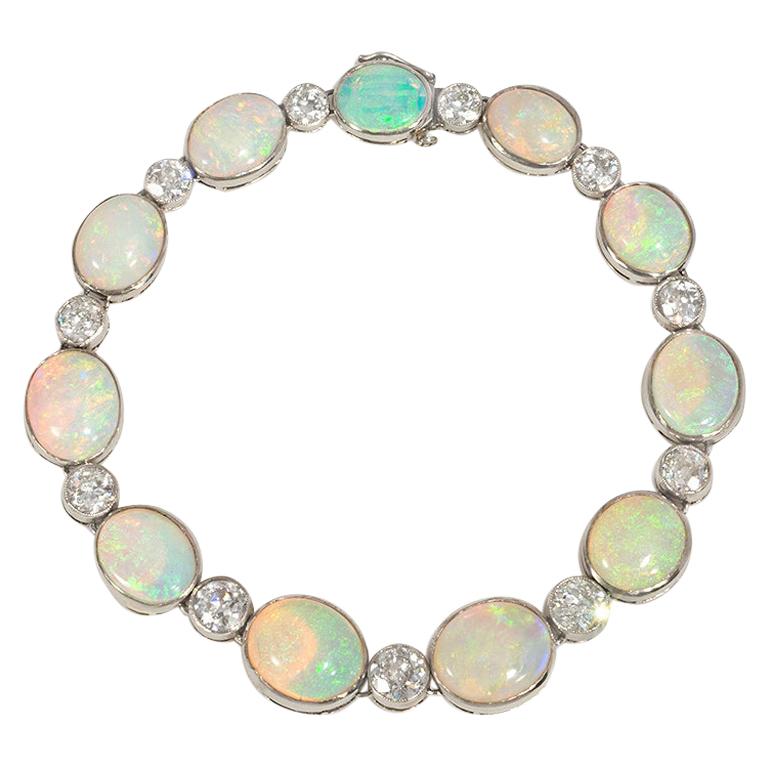 French Art Deco Opal, Diamond, and Platinum Line Bracelet For Sale