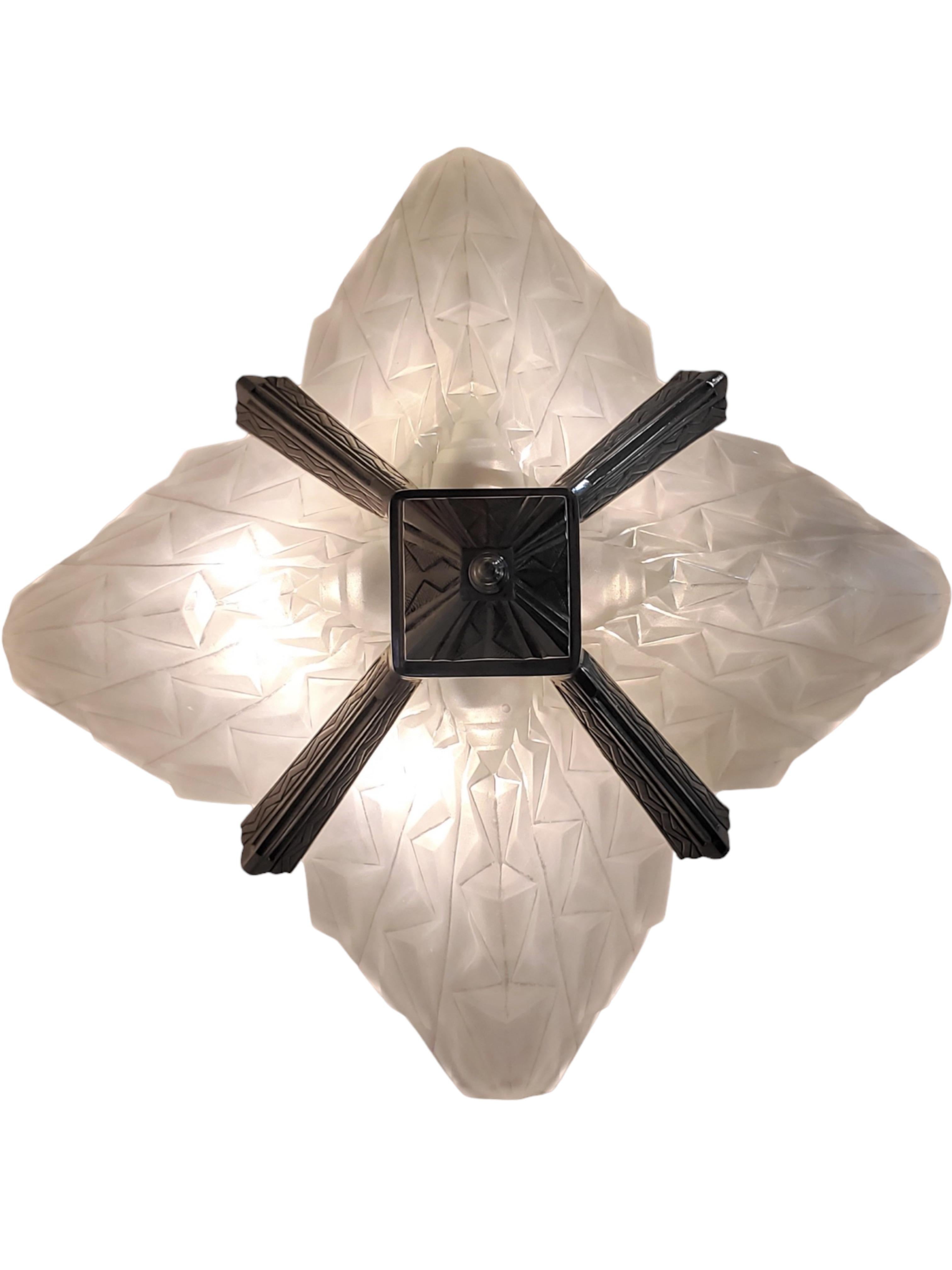 Bronze French Art Deco original 4 panel geometric frosted art glass chandelier by Degue For Sale