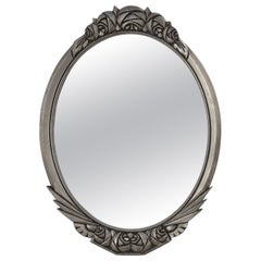French Art Deco Oval Mirror with Carved Roses and Silver-Painted Frame, 1920s