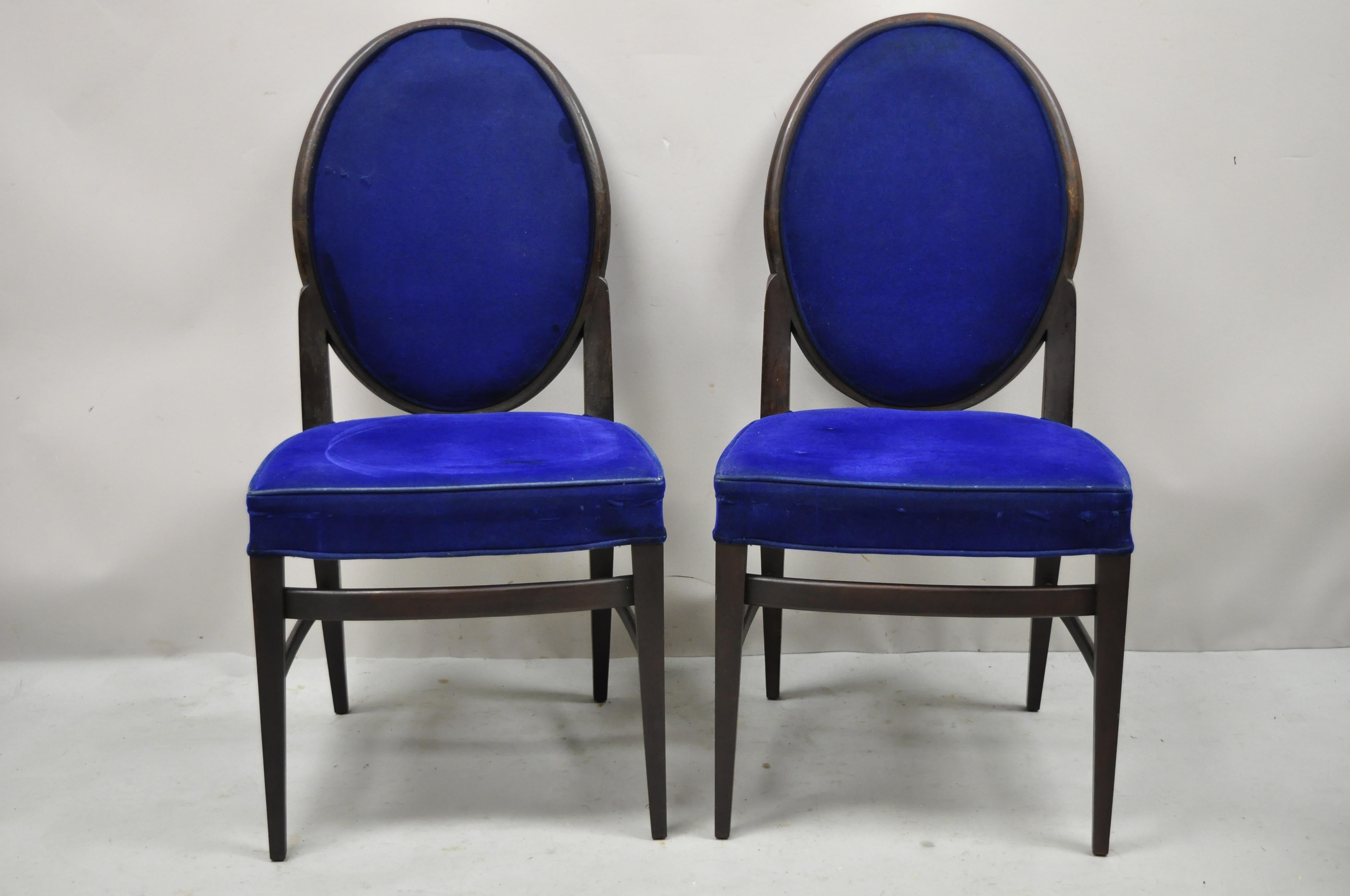 French Art Deco oval upholstered back mahogany wood frame dining chairs - a pair. Item features oval upholstered backs, solid wood frames, tapered legs, very nice vintage pair, clean modernist lines, great style and form. Circa mid 20th century.