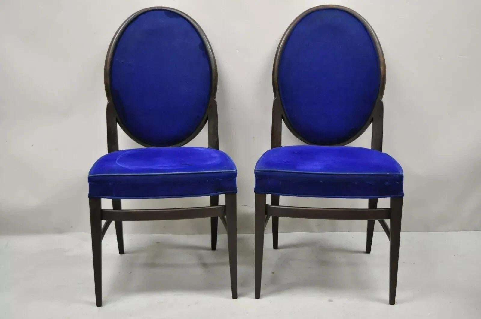 French Art Deco Oval Upholstered Back Mahogany Frame Blue Dining Chairs - a Pair. Item features oval upholstered backs, solid wood frames, tapered legs, very nice vintage pair, clean modernist lines, great style and form. Circa Mid 20th Century.