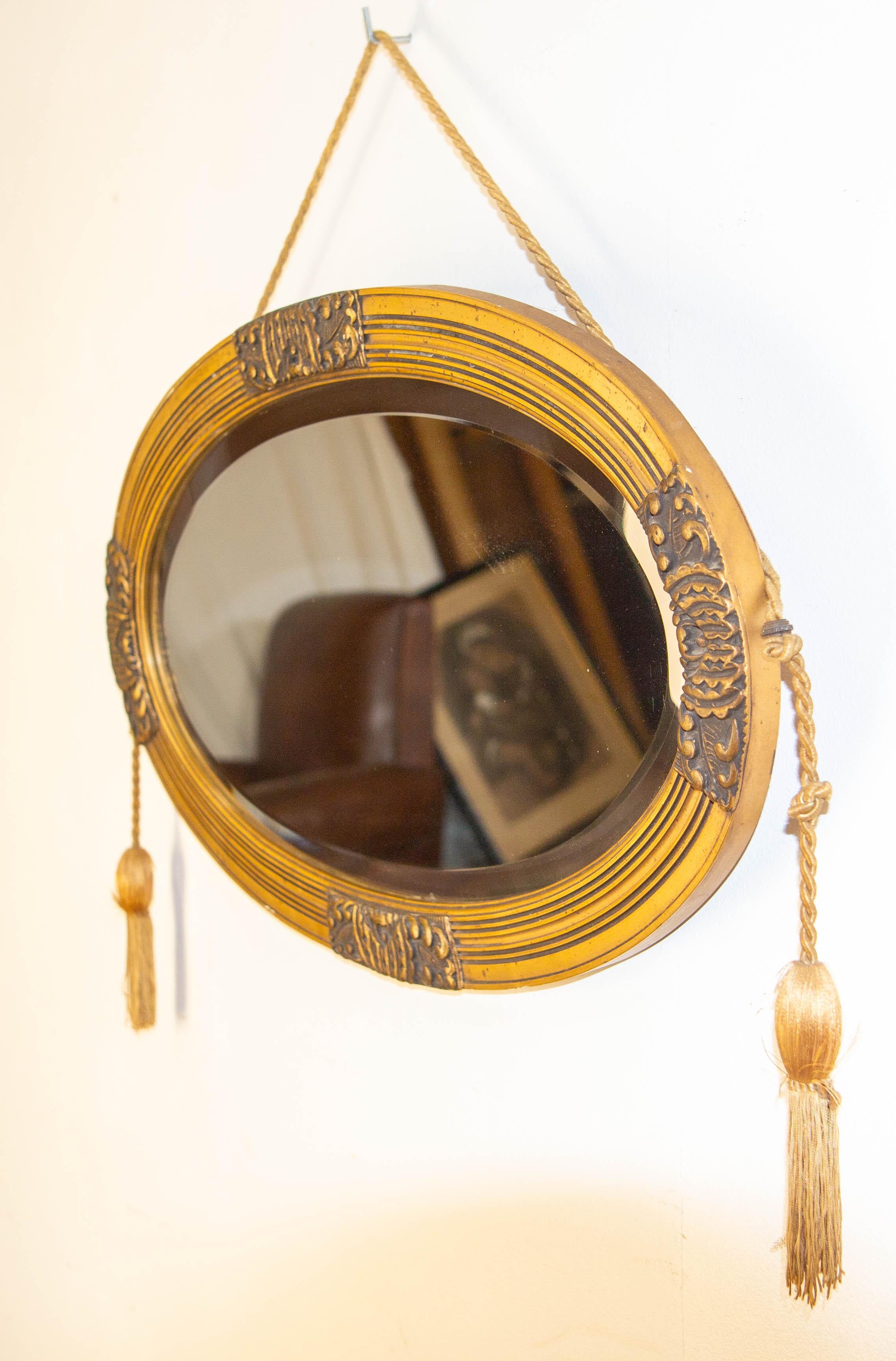 Mid-20th Century French Art Deco Oval Wall Beveled Mirror Golden Stucco, circa 1930 For Sale