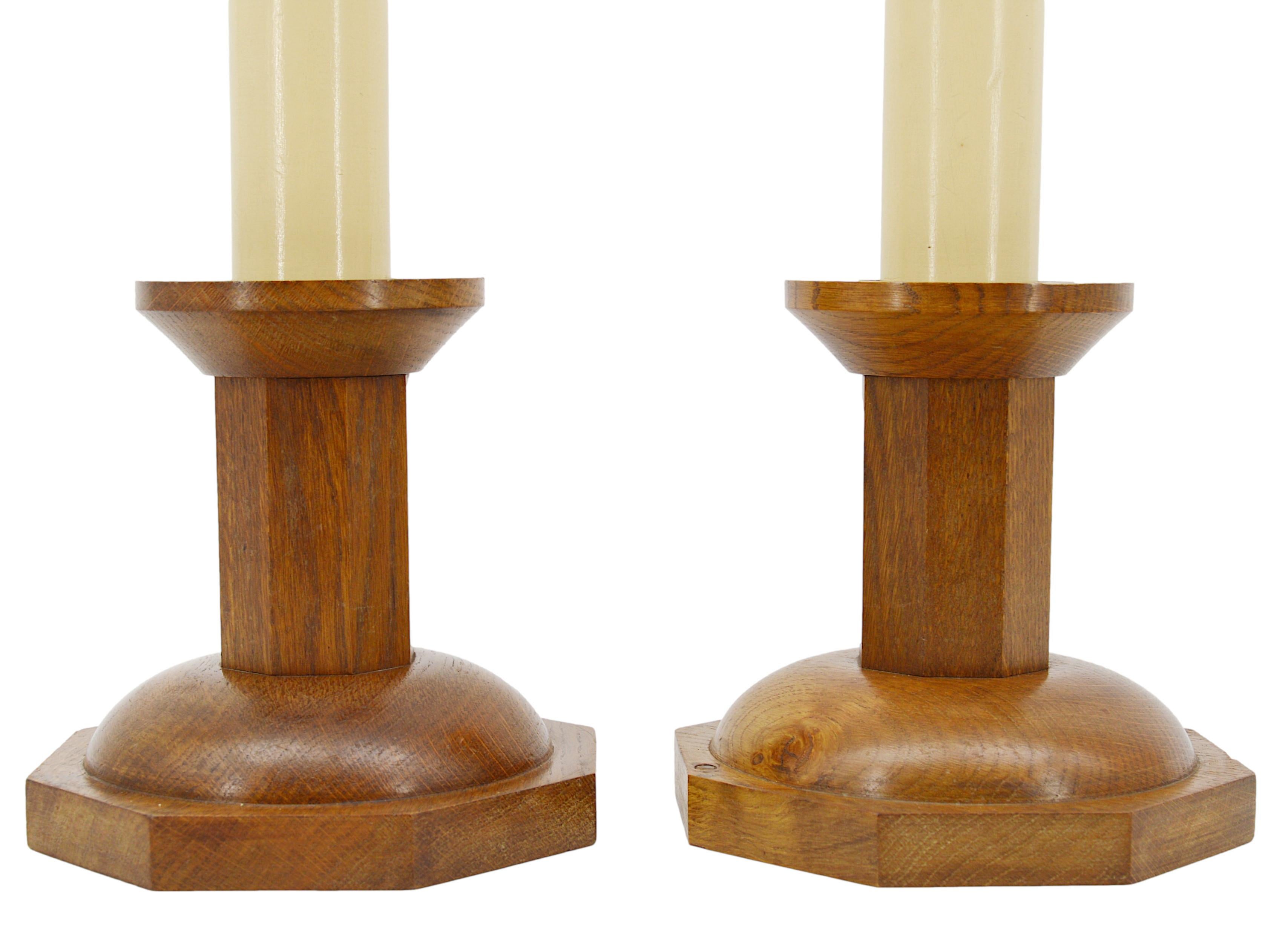 French Art Deco pair of oak candlesticks from the Sainte-Claire de Mur de Barrez monastery (Poor Clares, read below), France, ca.1930. Wooden faux-candles. Close to the work of Ateliers de Marolles, Jean Touret. Measures: height: 13.4