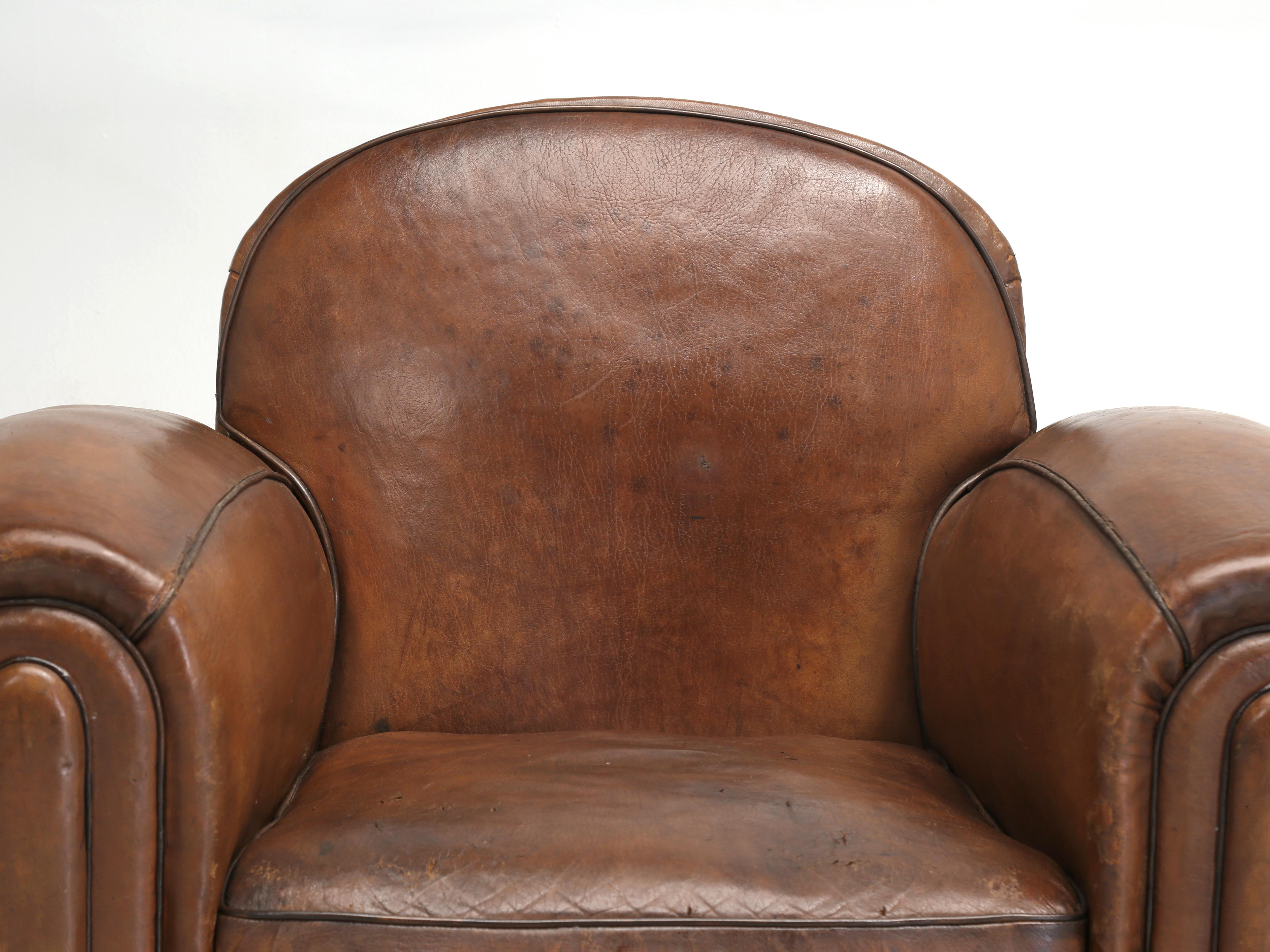 French Leather Club Chairs that have been painstakingly restored from the inside out, while at the same time leaving their original French leather coverings intact. And speaking of the Original French Leather Club Chairs leather and color, I am not