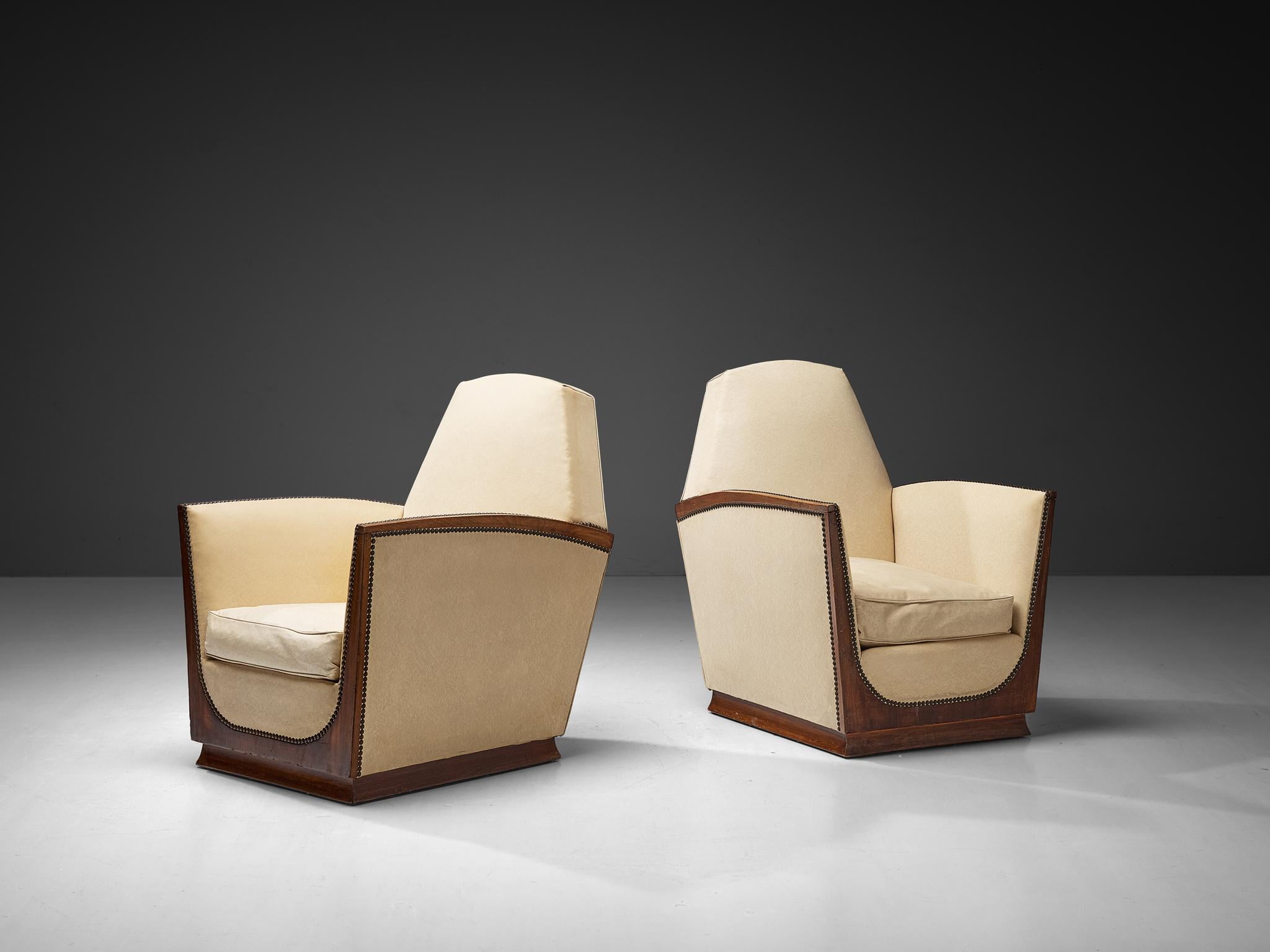 Pair of lounge chairs, walnut, faux leather, France, 1930s

These beautifully designed lounge chairs are created in one of the most influential periods for the arts namely the Art Deco Movement. These lounge chairs originate from France and show