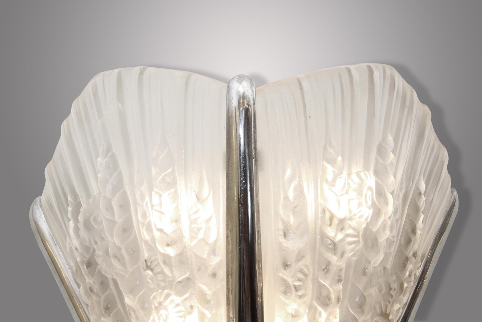 20th Century French Art Deco pair of sconces by Genet & Michon For Sale