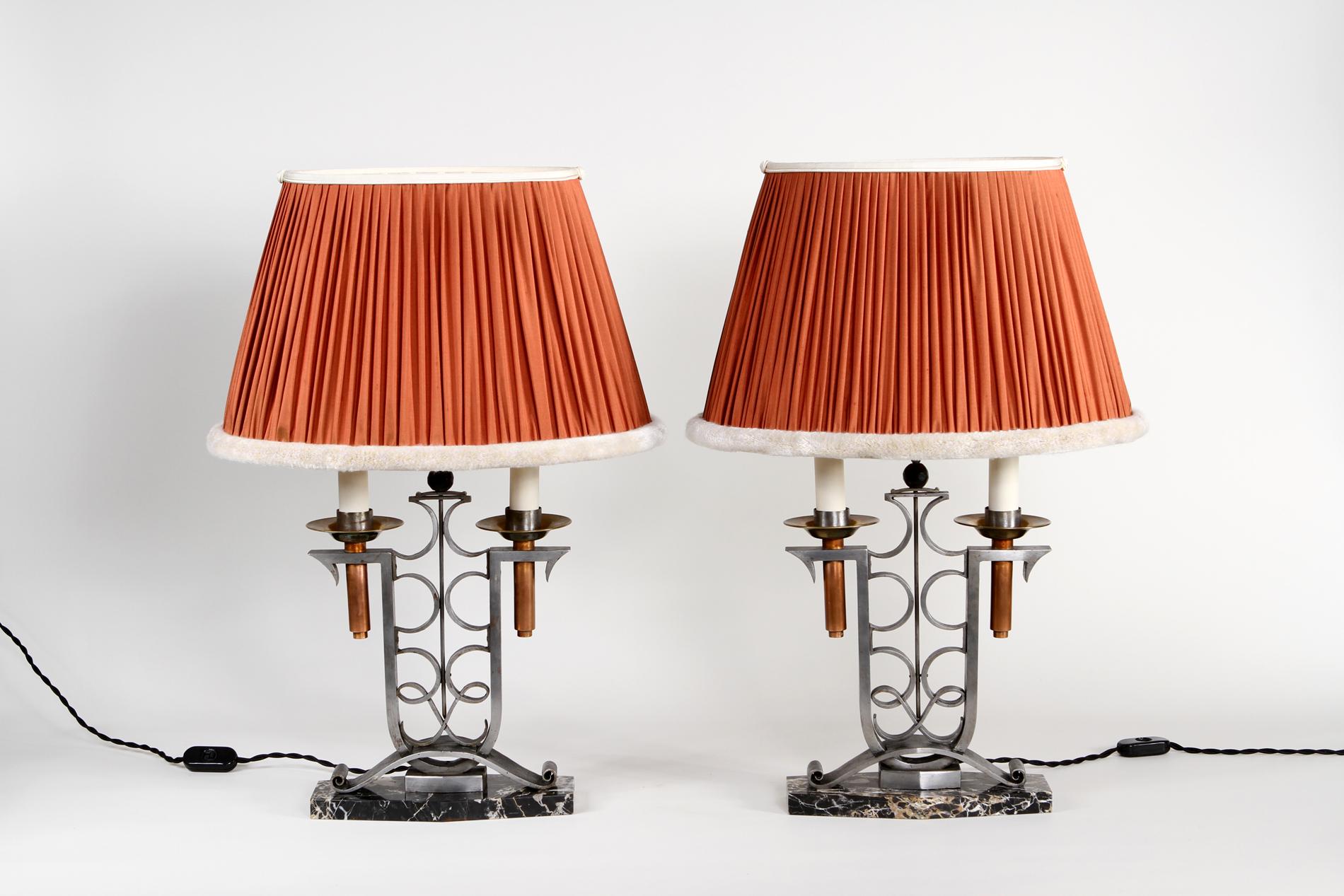 Exceptional original pair of French Art Deco by Raymond Subes circa 1930 in wrought iron and copper details and portor marble base. An elegant model with a custom made lampshade to enchanting any interior with the french art deco style.  The lamps