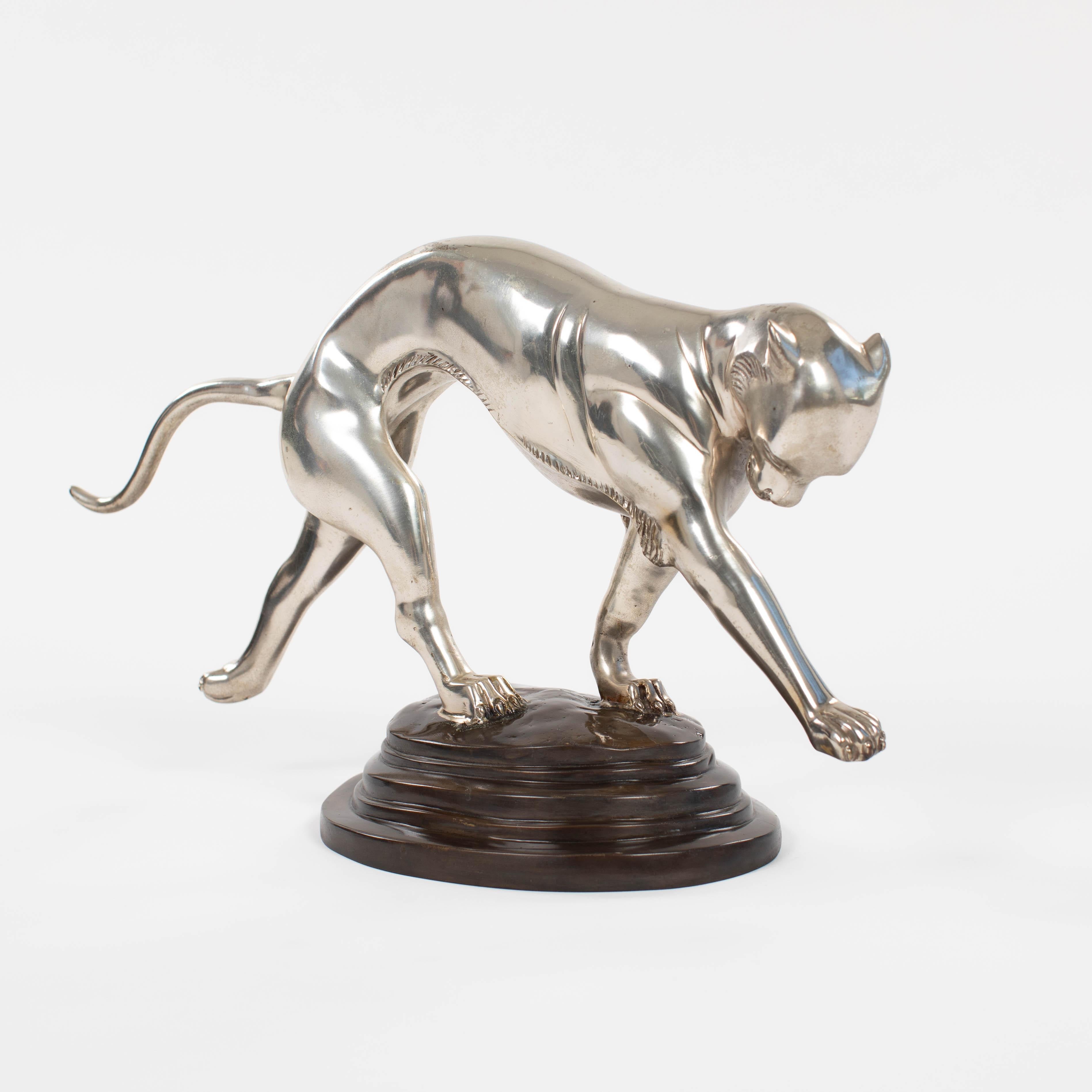 French Art Déco Panther Sculpture in Dynamic Movement Cast Bronze Silvered 1920s

Fantastic Art Deco panther sculpture in a very elegant movement.
The base is oval and stepped and 2 paws of the animal are on the base, the other two legs are in the