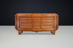 French Art Deco Patinated Oak Sideboard with Relief Carved Doors, 1940s
