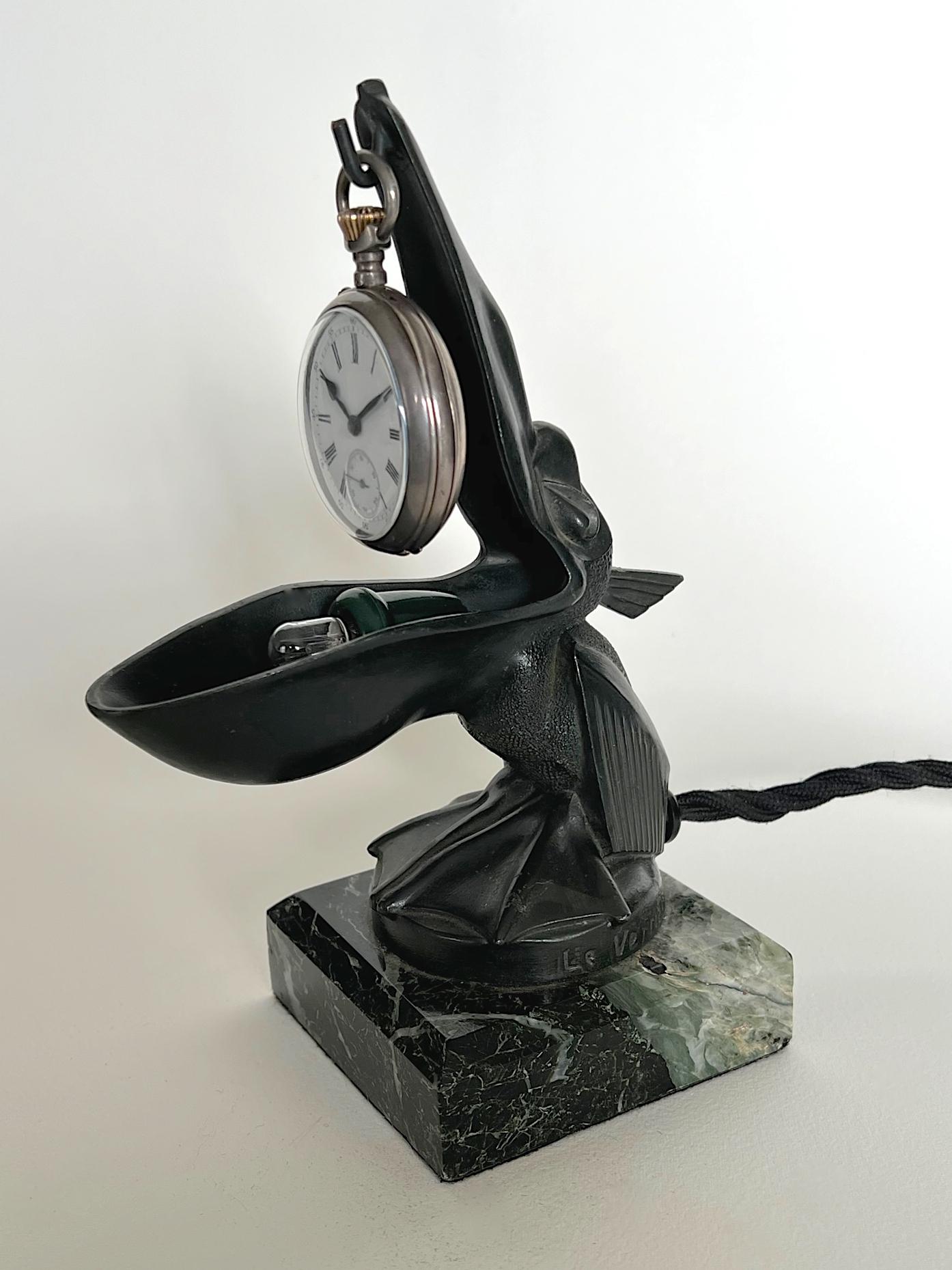 Cast French Art Déco 'Pélican' Night Light / Pocket Watch Holder by  Max Le Verrier  For Sale