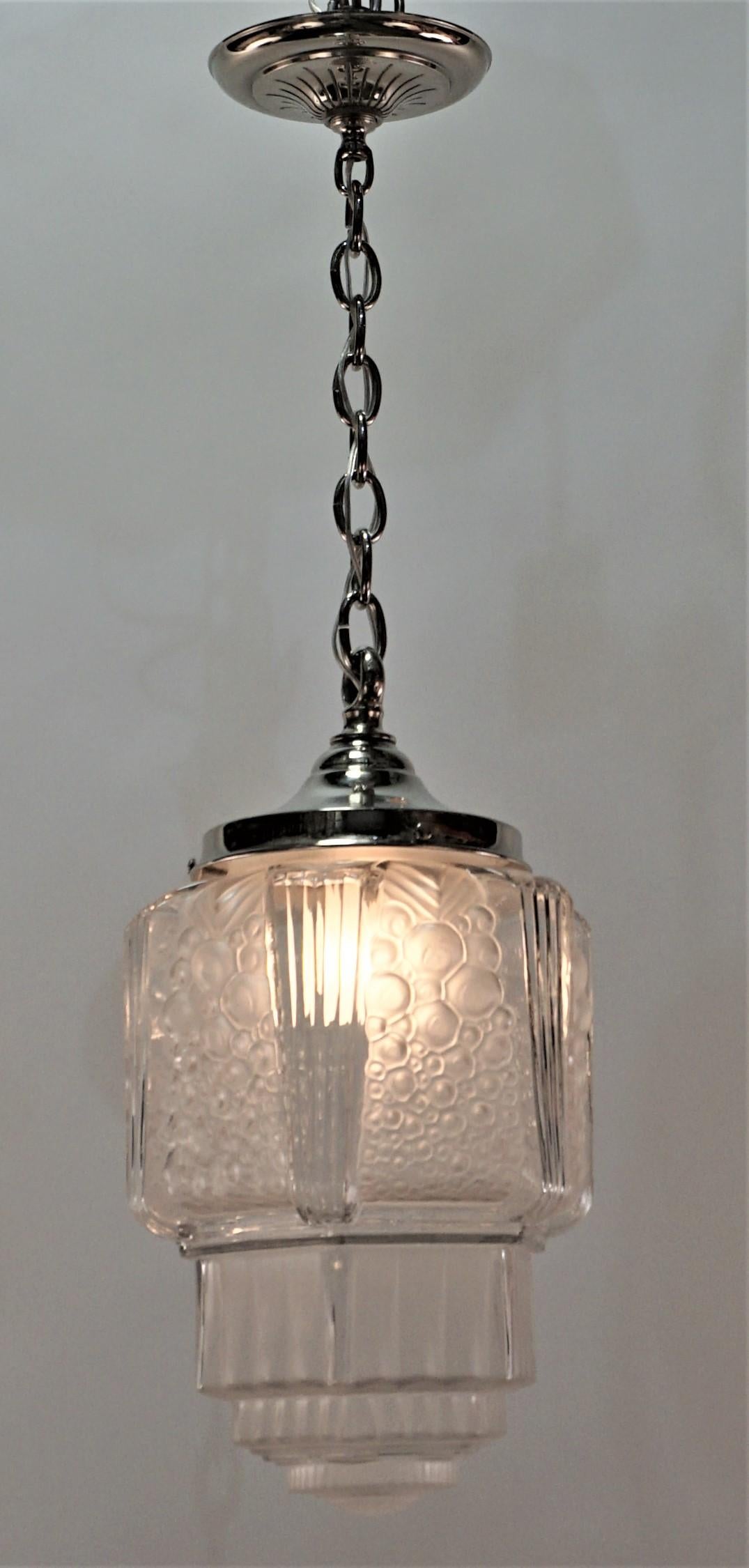 Clear Frost glass glass shade with nickel on bronze fitting Art Deco pendant chandelier.
Minimum height fully installed with 1 link of chain 19