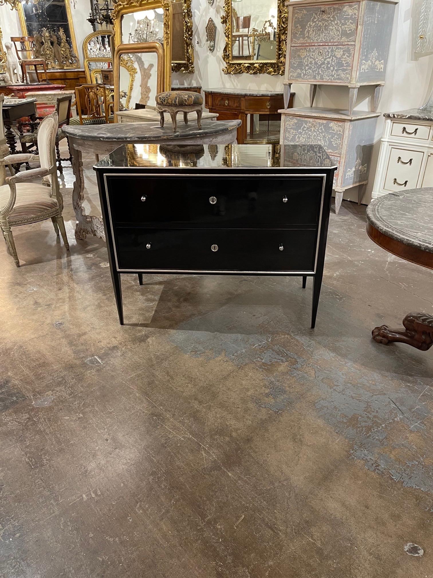 Period French Art Deco piano black and silver leaf 2 drawer commode. This piece has an exceptional finish. Very stylish!!