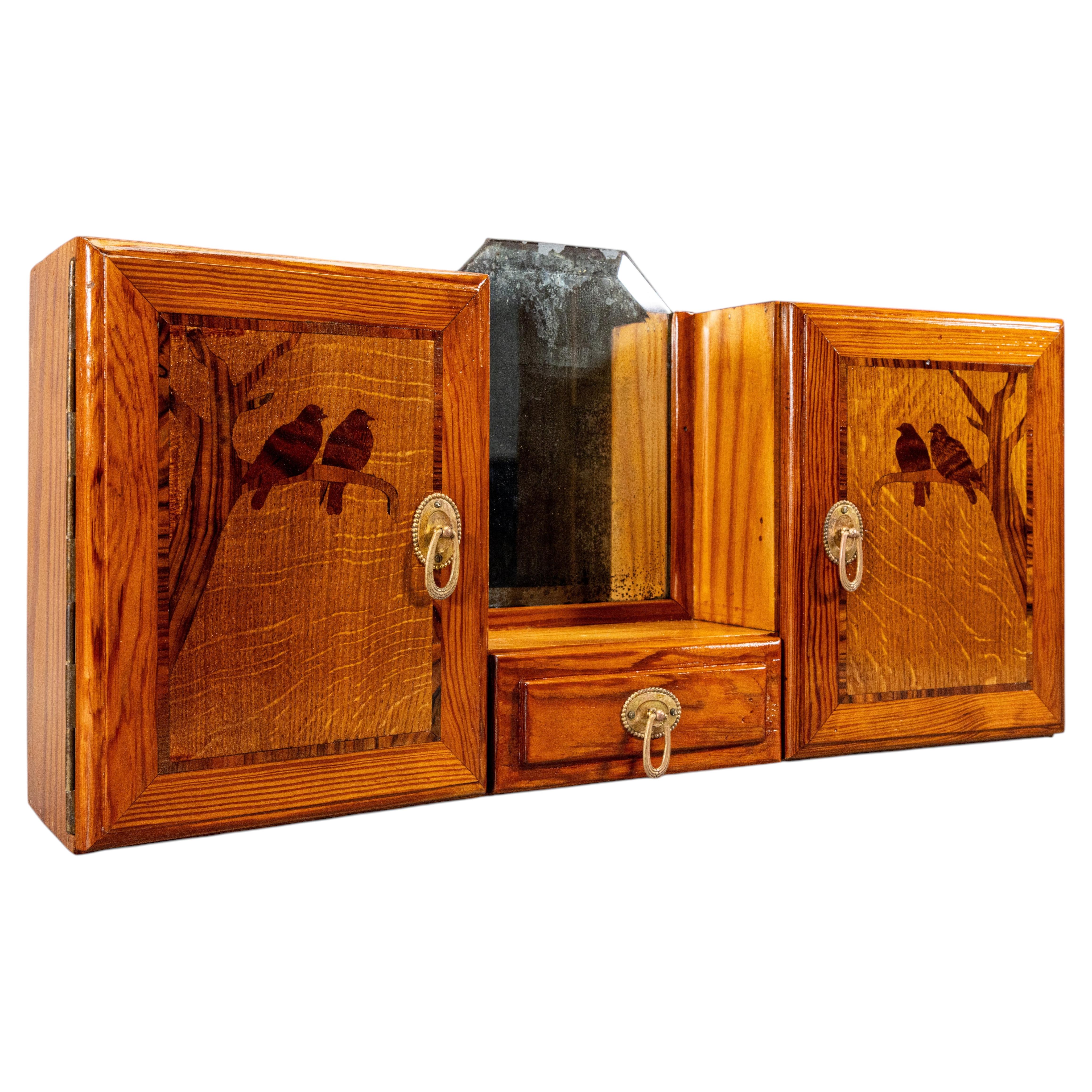 French Art Deco Pine Wood Wall Cabinet with Bird Marquetry, Mirror, ca. 1930s For Sale
