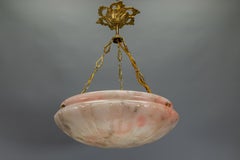 Suspension en bronze et albâtre rose et gris de style Art déco français, vers 1920