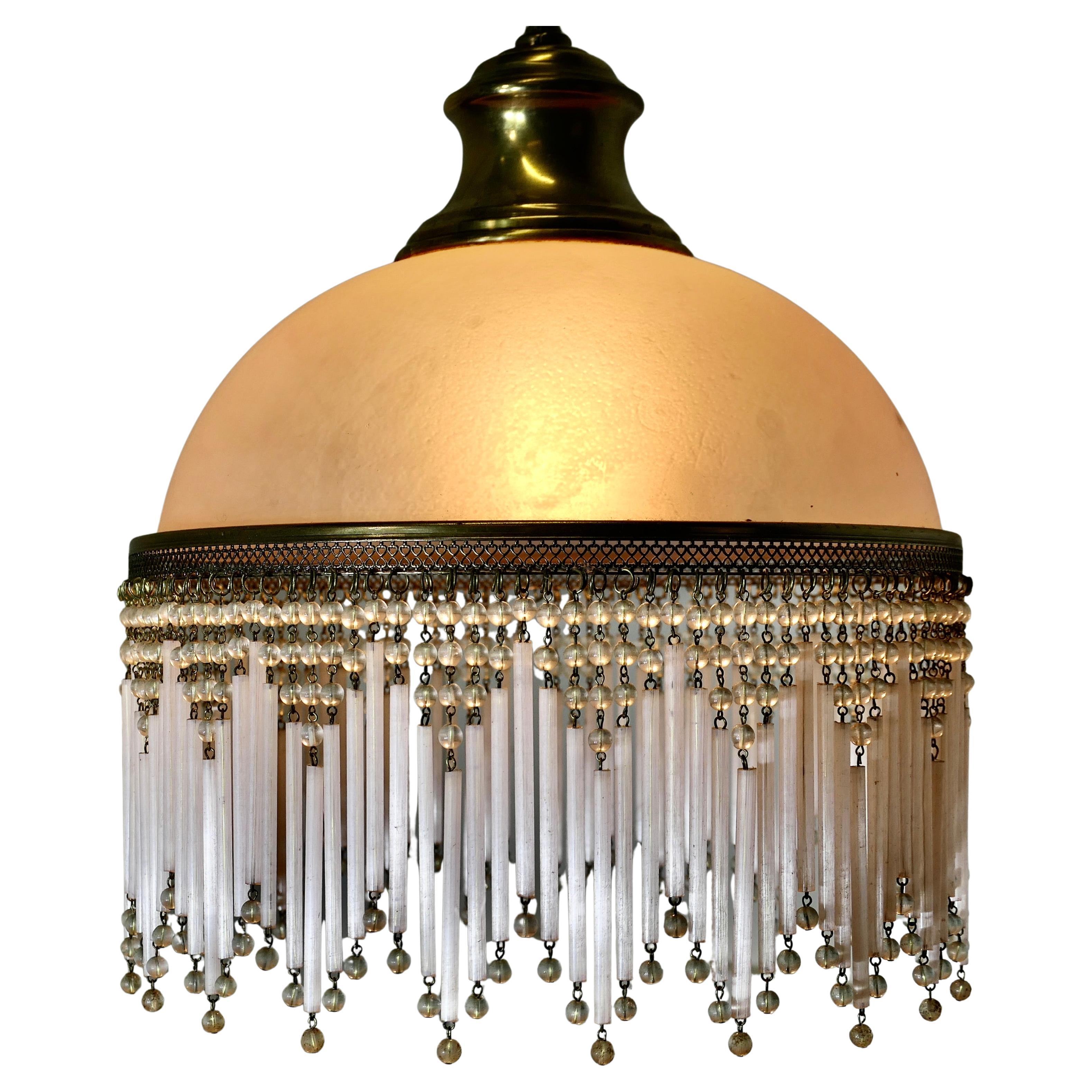 French Art Deco Pink Glass Light with Beaded Shade  A very pretty piece