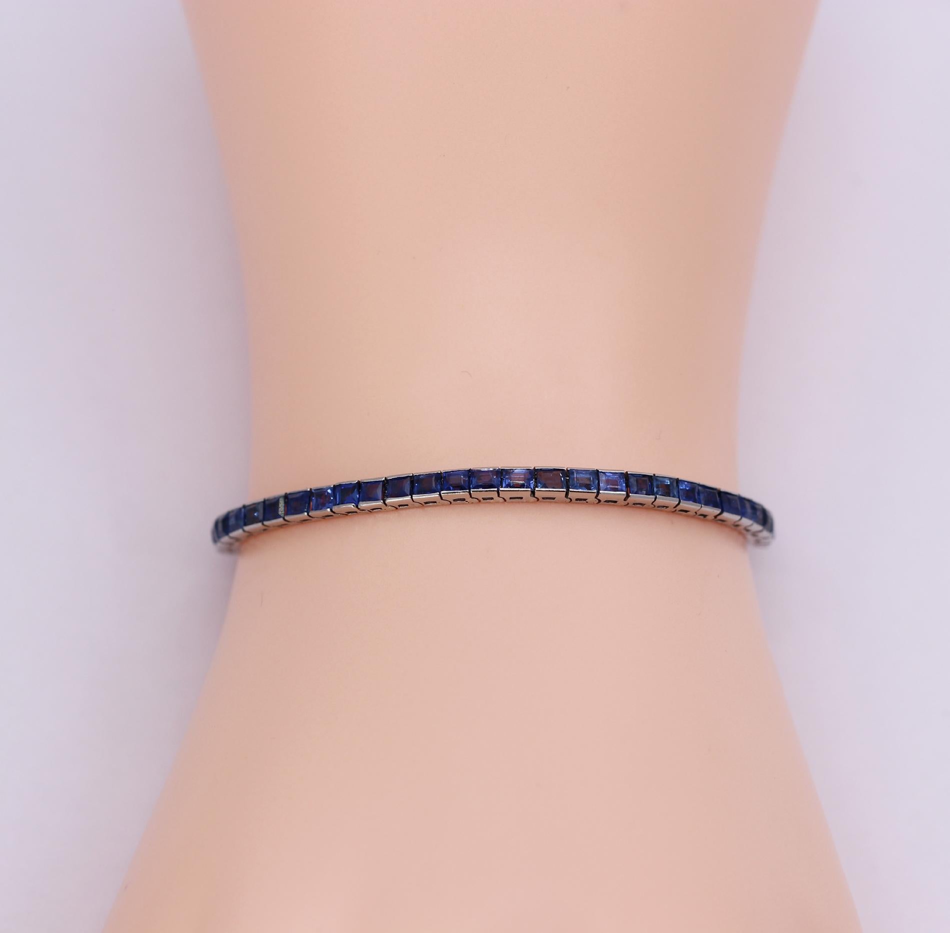 French Art Deco Platinum and Natural Sapphire Channel Set Line Bracelet In Good Condition In Palm Beach, FL